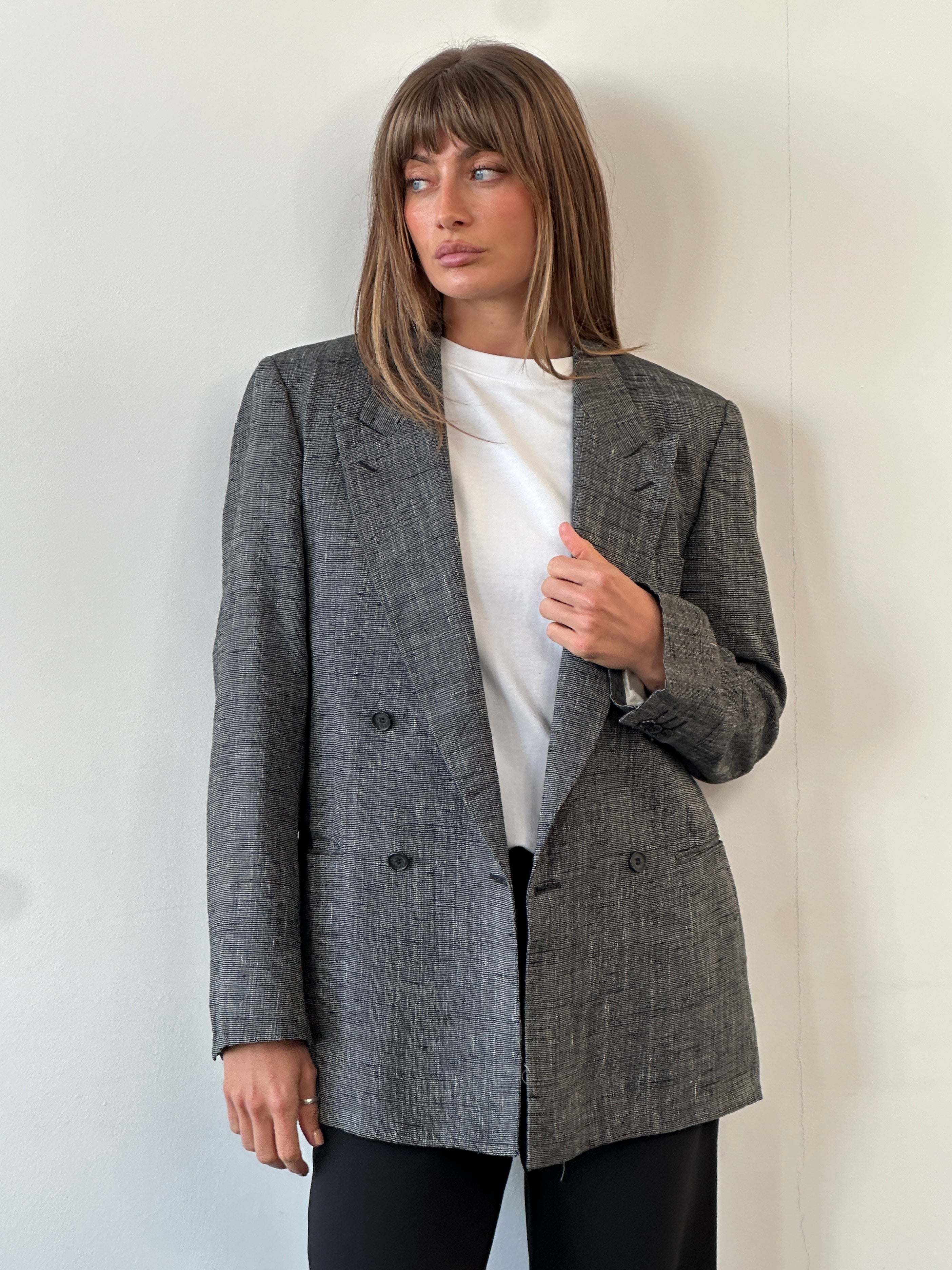 Yves Saint Laurent men's double-breasted blazer in 1980s style, dark fabric with wide lapels, size 38R/M, tailored fit.
