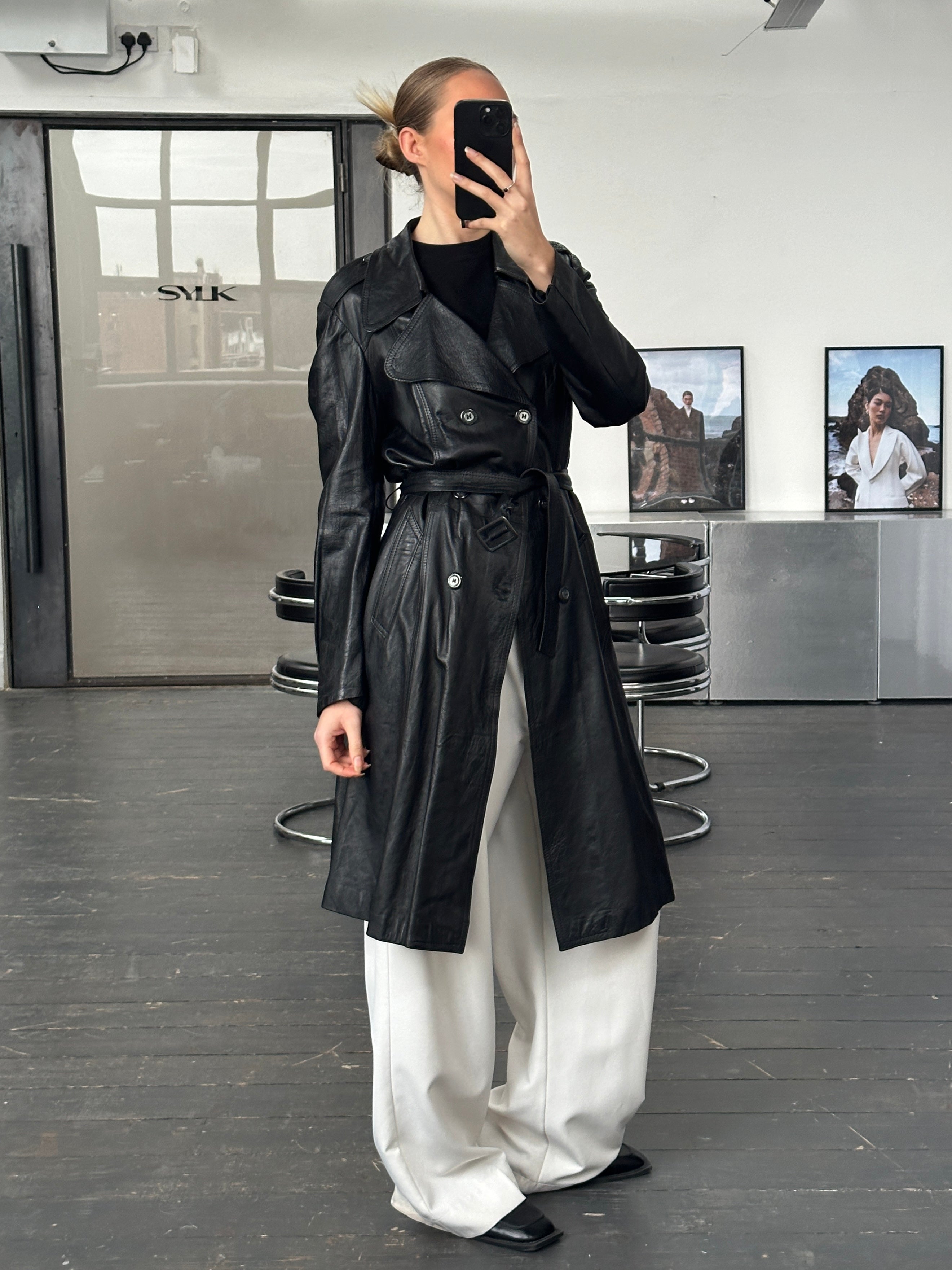 Vintage 1990s leather double-breasted trench coat, M/L size, featuring classic design and stylish details.