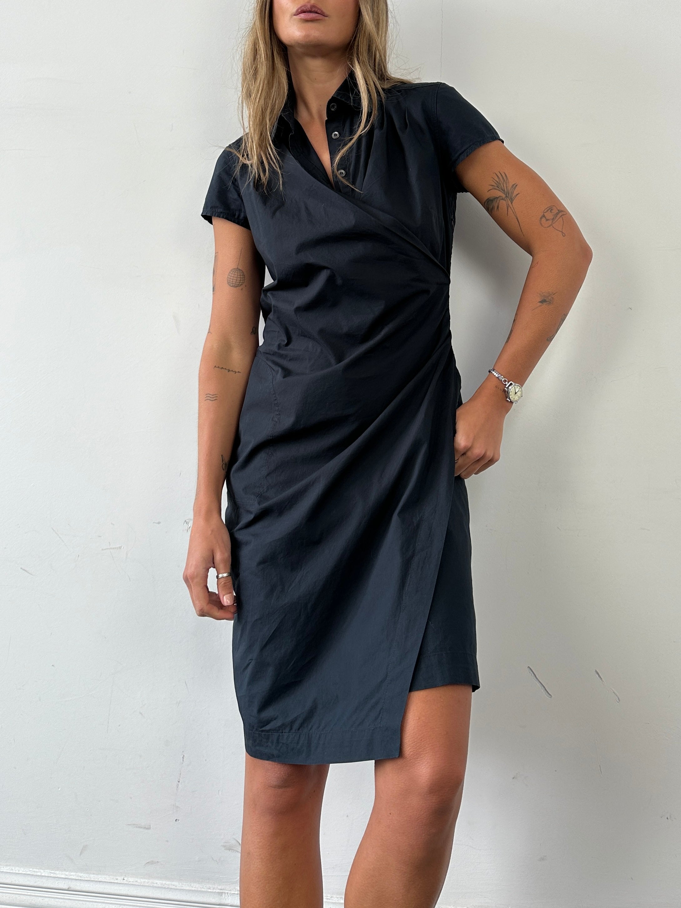 Max Mara Weekend wrap shirt dress in soft fabric, featuring a collar, long sleeves, and a waist tie for a chic, relaxed look.
