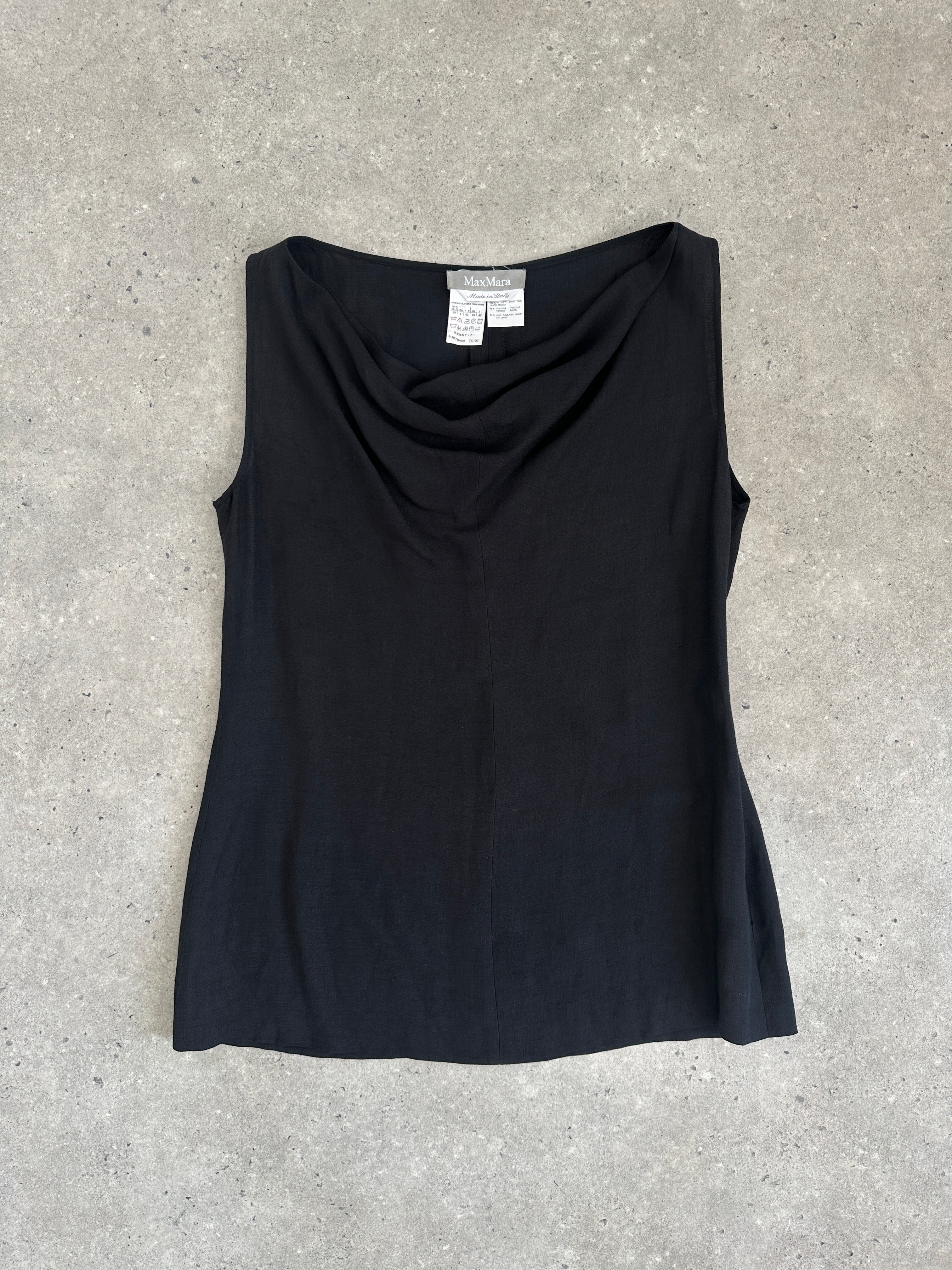 Max Mara linen cowl neck sleeveless tank top in light fabric, shown in a natural stance.