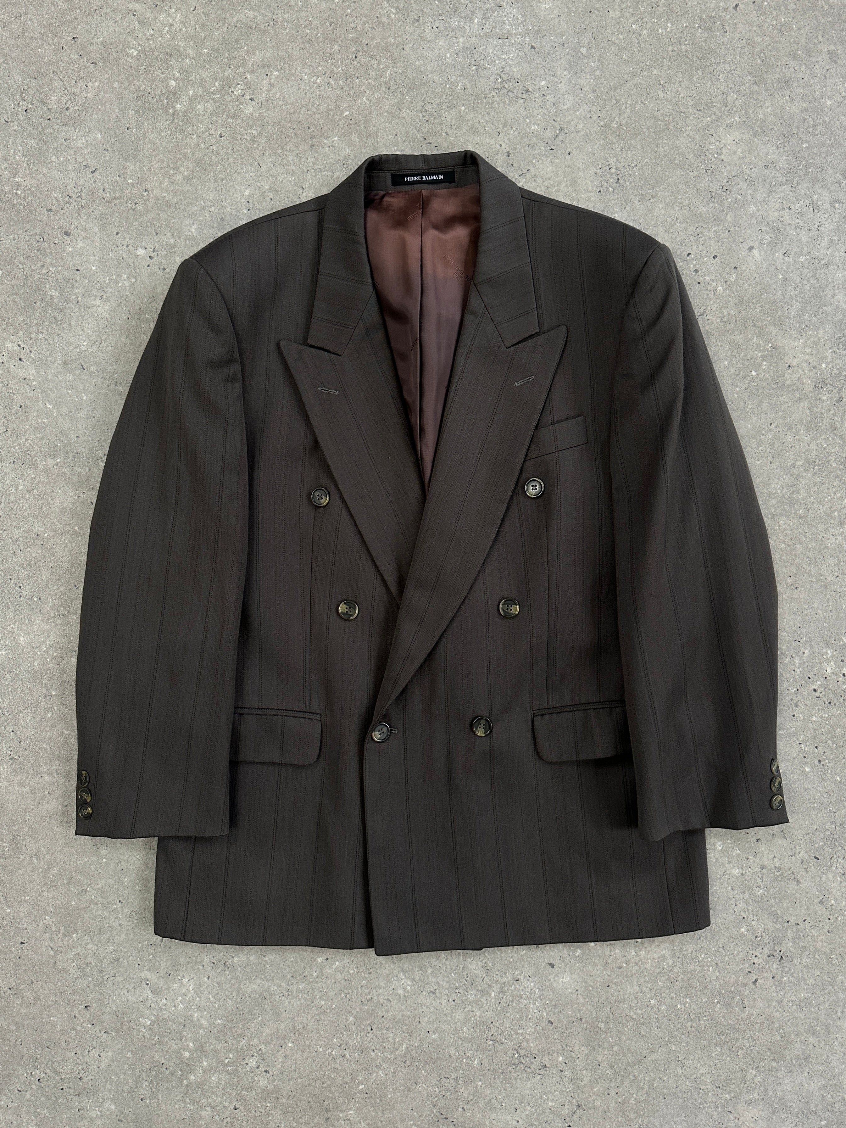 Pierre Balmain 1980s double-breasted pure wool blazer in size 40S/L, featuring classic tailoring and a structured fit.