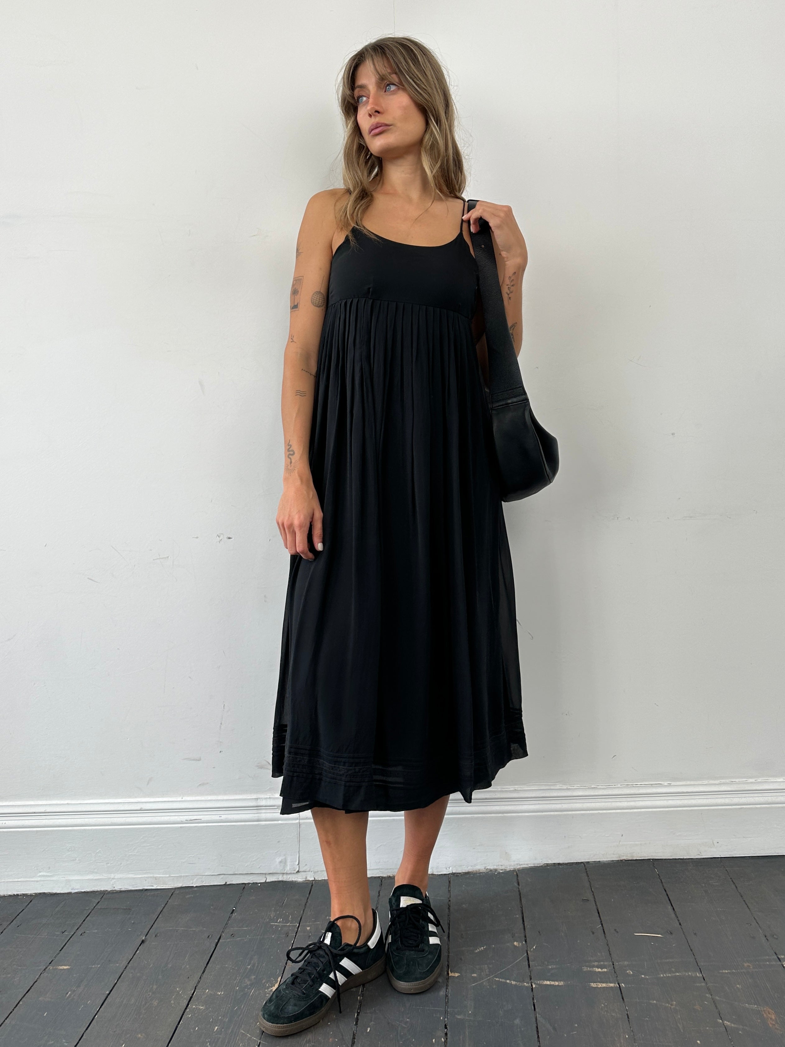 Laura Ashley pure silk pleated slip dress in XS, shown on model with elegant design and soft fabric, suitable for stylish occasions.