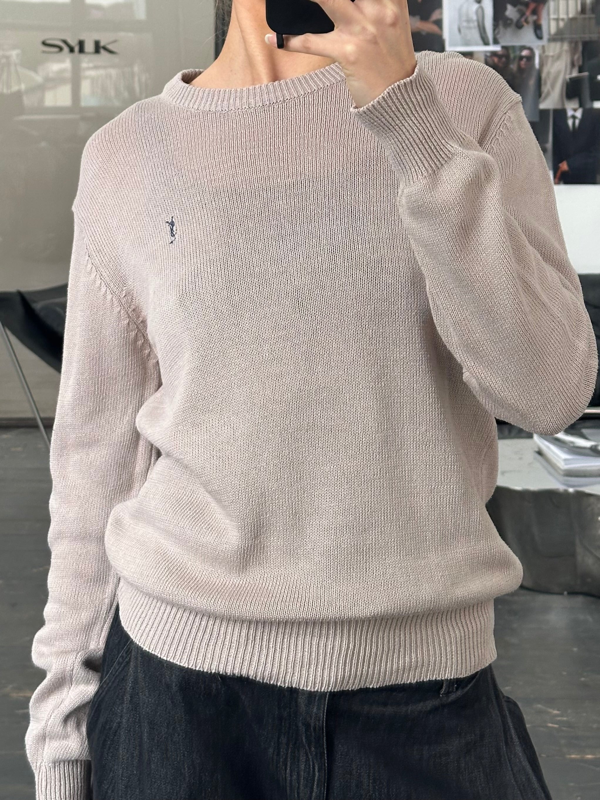 Yves Saint Laurent 1990s cotton knitted jumper in cream, fitted style, featuring ribbed cuffs and neckline, casual sportswear look.