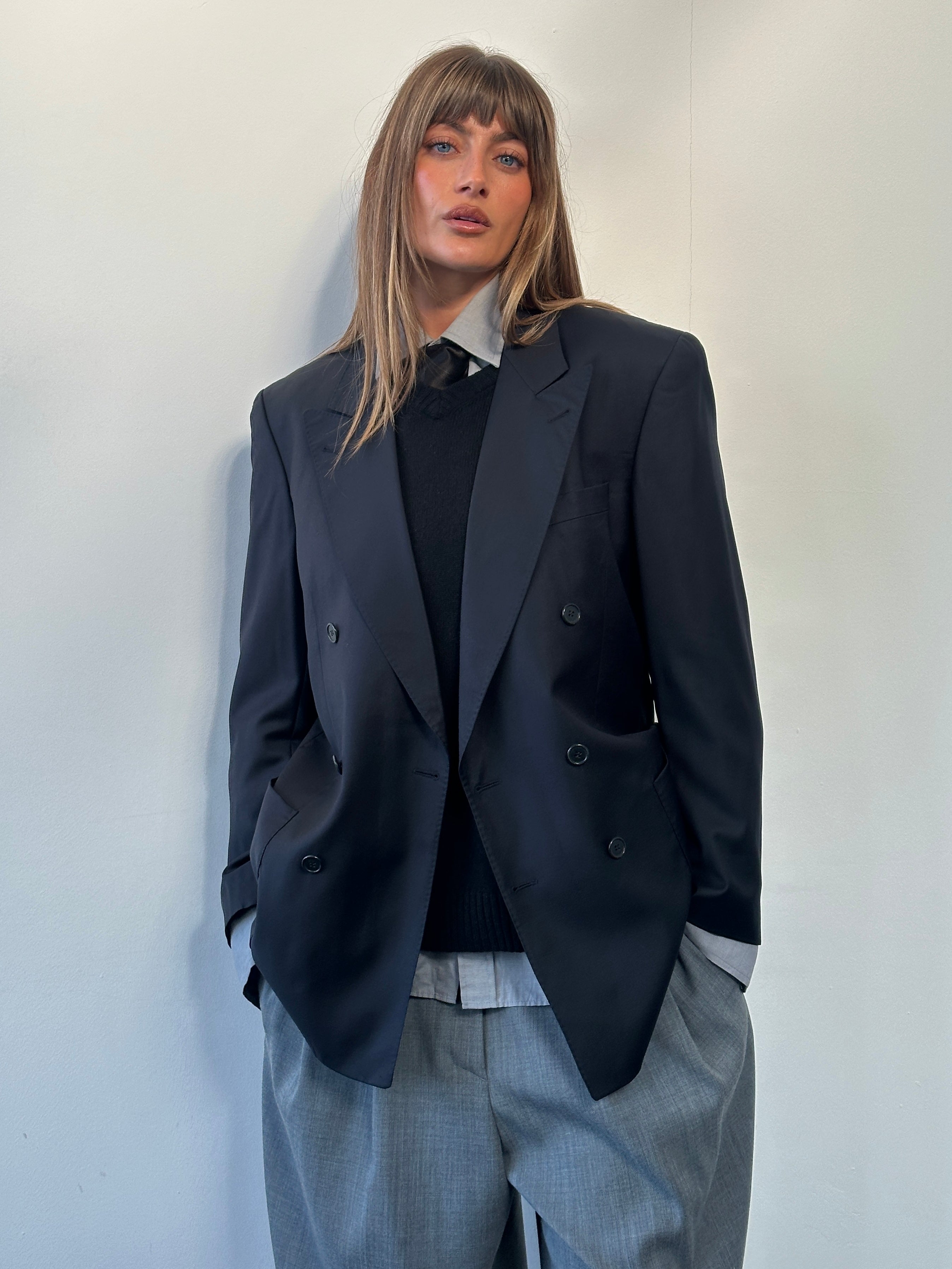 Louis Feraud x Loro Piana 1990s pure wool double-breasted blazer, size 40R, displayed on a hanger.