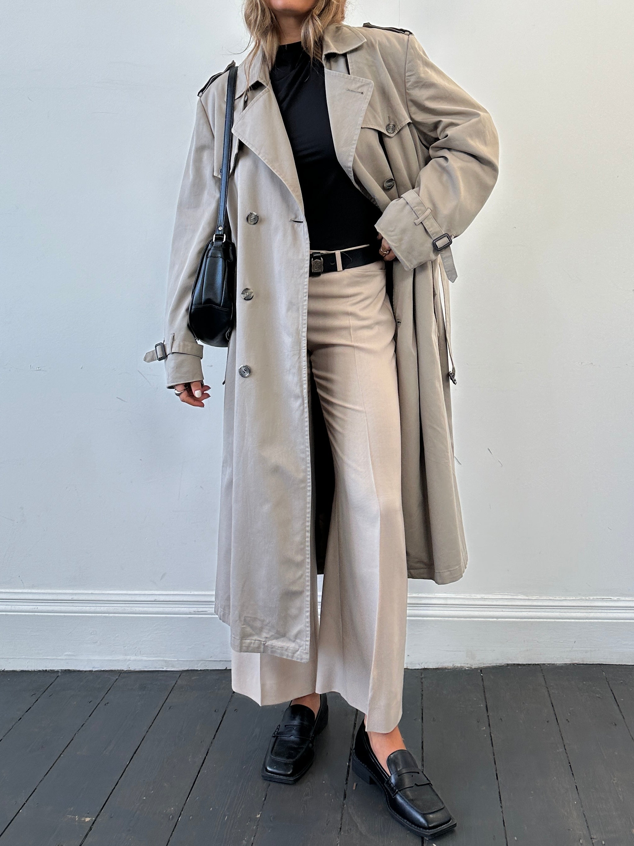 Christian Dior double-breasted cotton trench coat in size L/XL, stylish outerwear with classic design and belt details.
