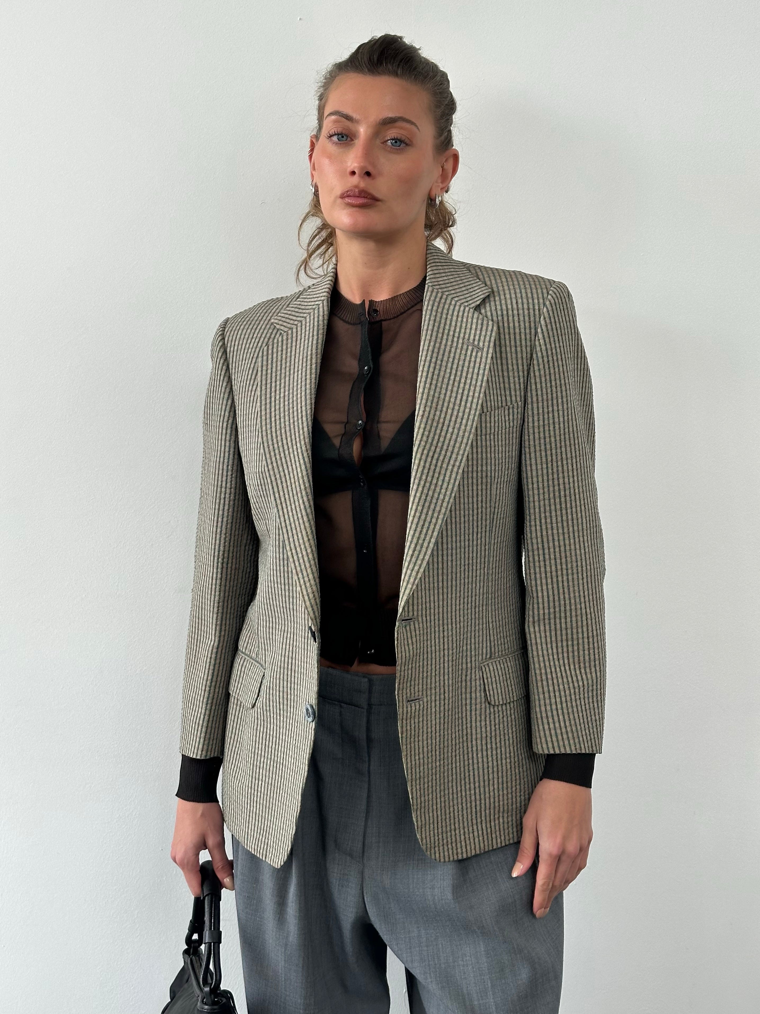 Burberry 1990s wool silk check unlined blazer in size S, featuring classic plaid pattern and tailored fit.