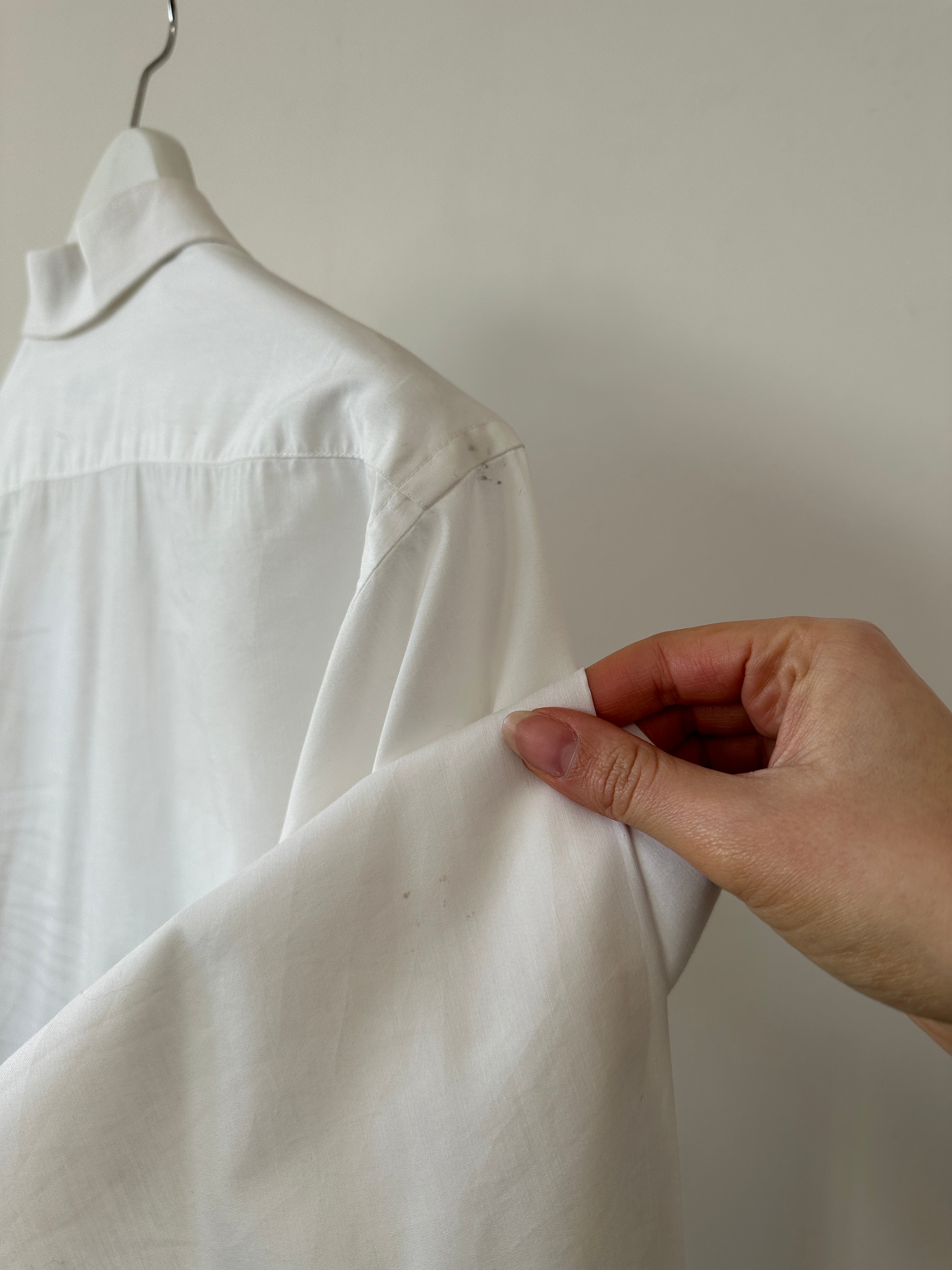 Christian Dior cotton logo shirt in size M/L, featuring the iconic Dior branding and a classic shirt design.