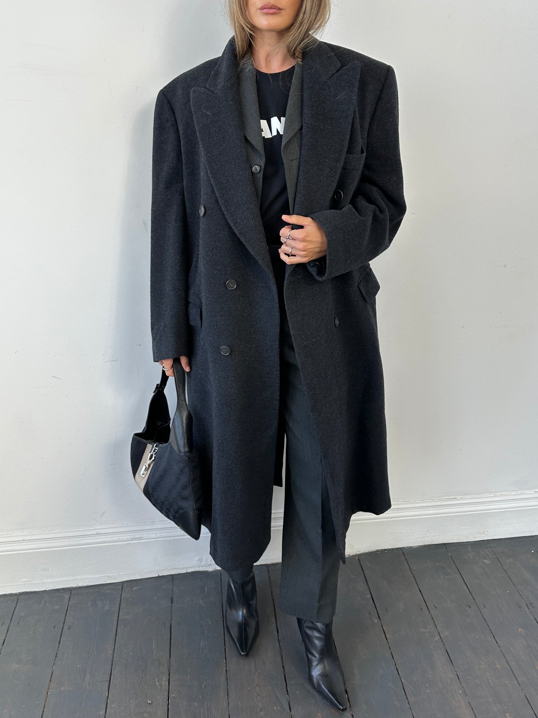Vintage brand vintage cashmere wool double-breasted coat in XL, showing classic style and textured fabric.
