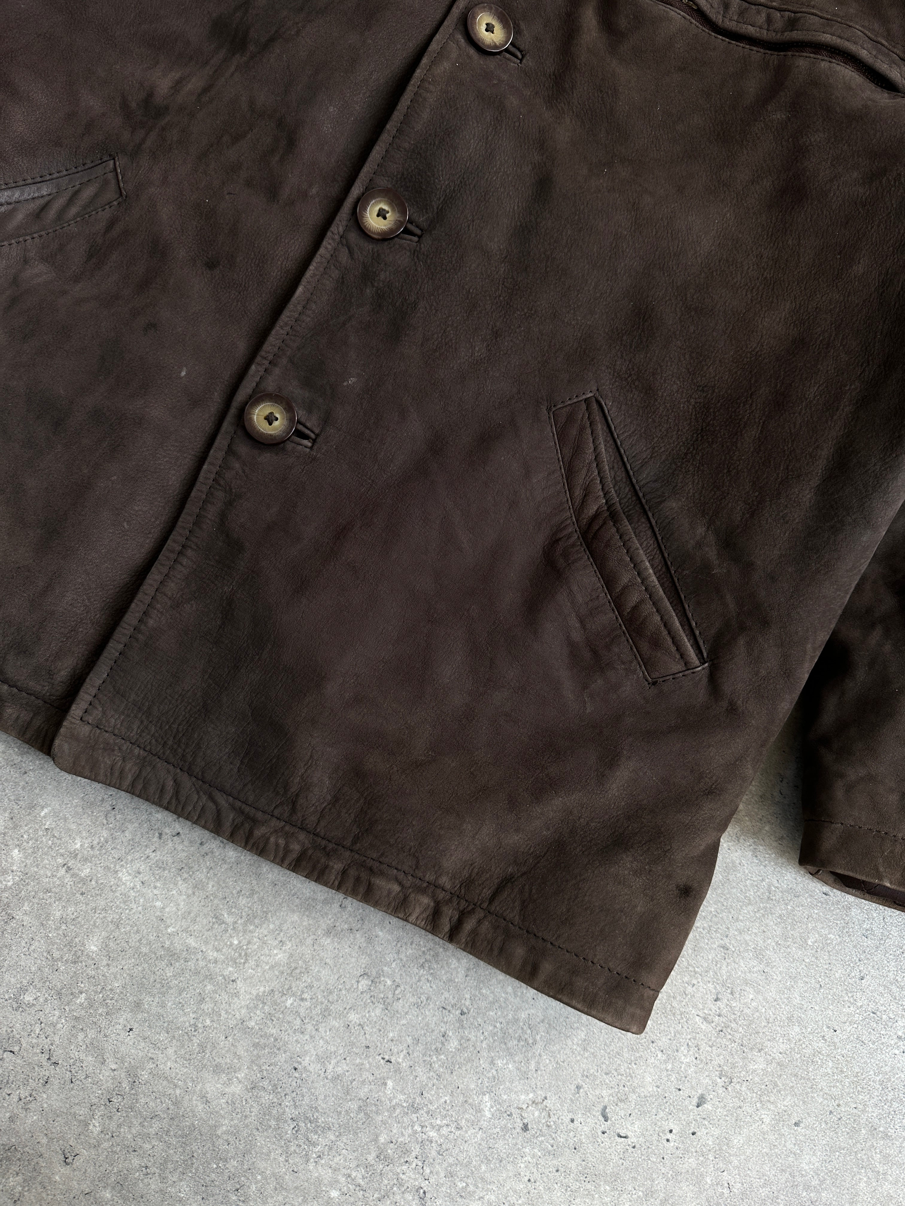 Vintage brand vintage nubuck leather jacket in size XL, showing a close-up of the soft, textured leather material.