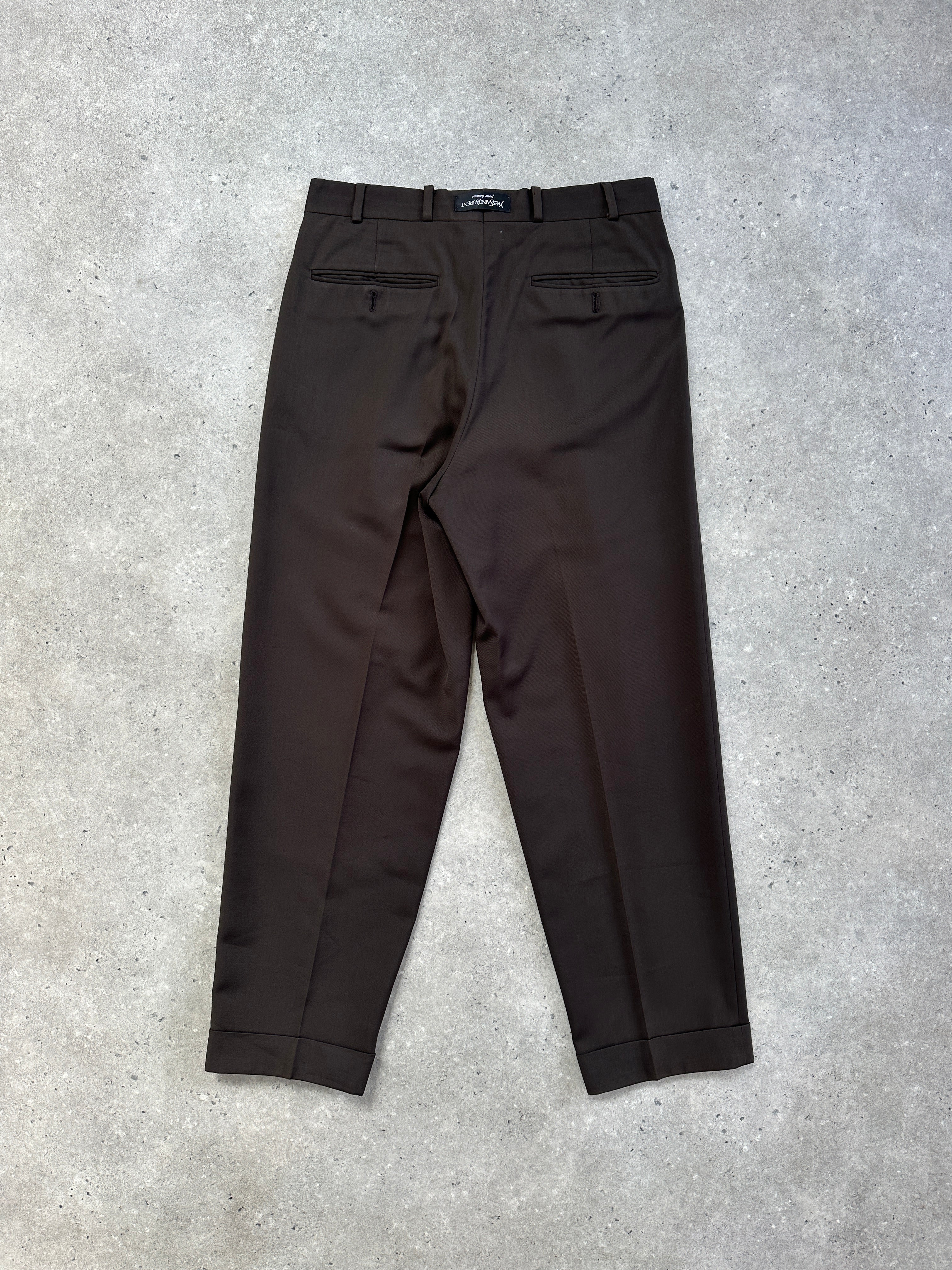 Yves Saint Laurent Pour Homme 1990s tailored wool trousers in size W28, showing the classic fit and fine fabric detail.