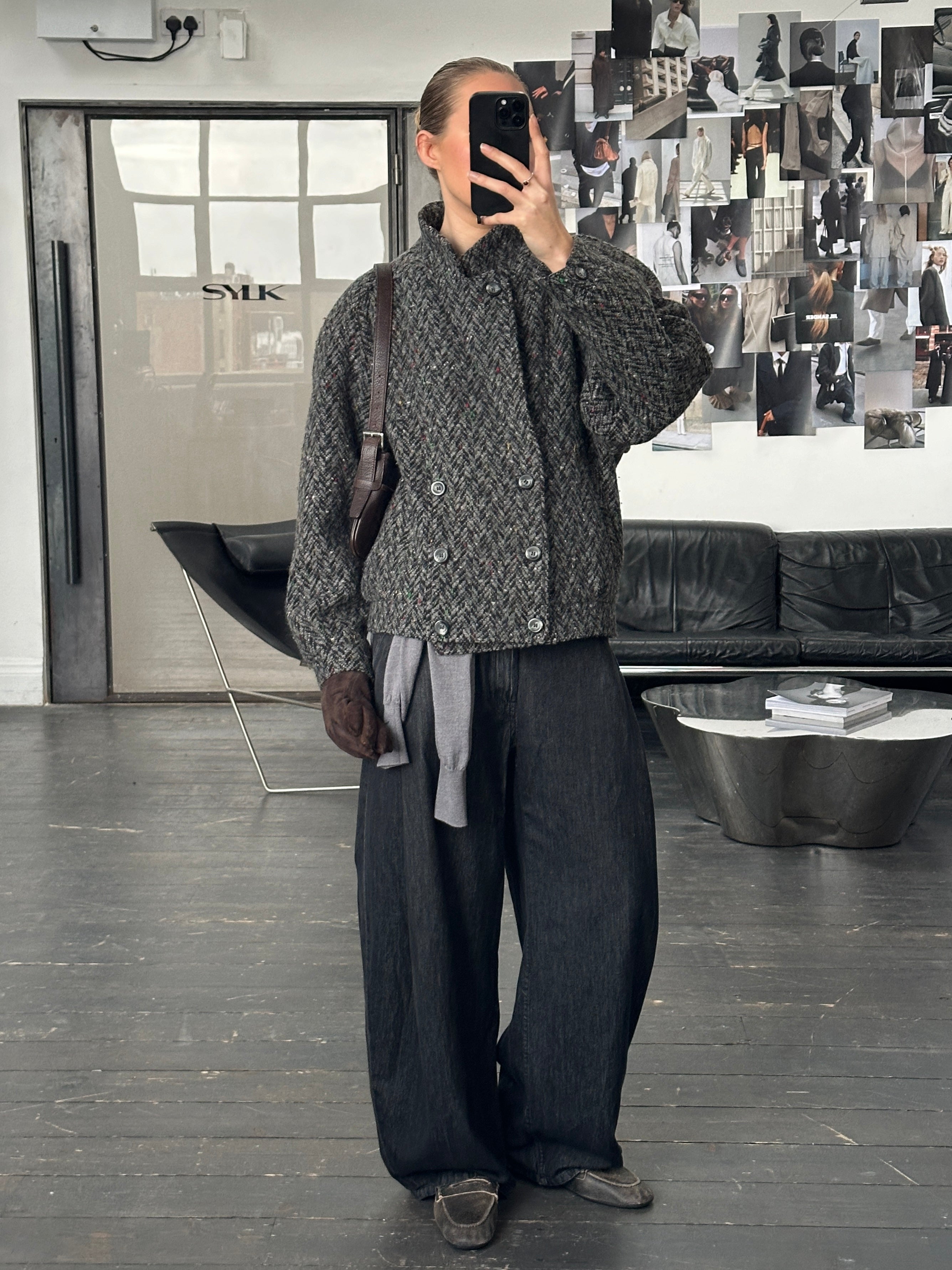 Vintage 1990s wool high neck bomber jacket in size M, featuring a classic retro design with a cozy high collar.