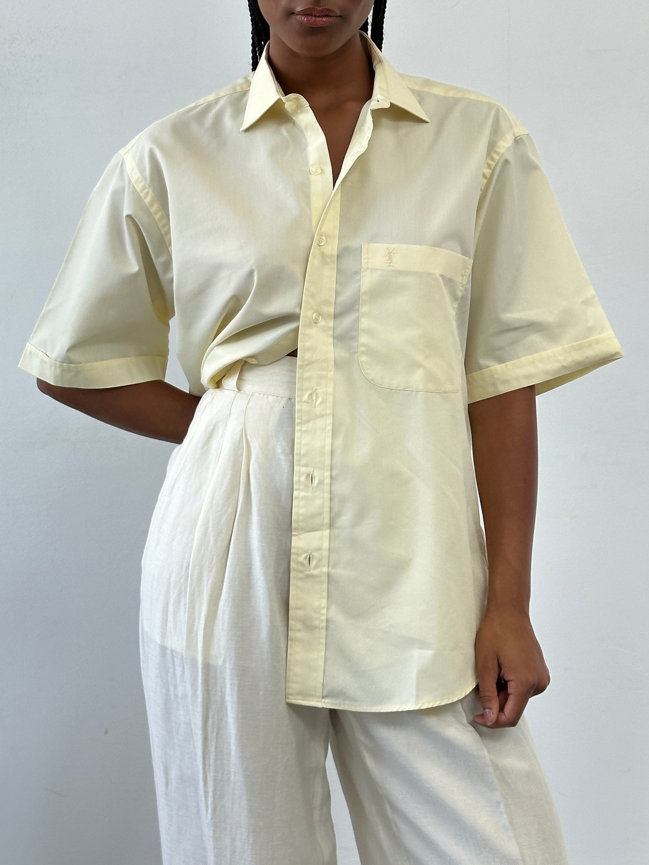 Yves Saint Laurent Pour Homme 1990s cotton short sleeve logo shirt in size L, featuring classic design and brand logo on front.