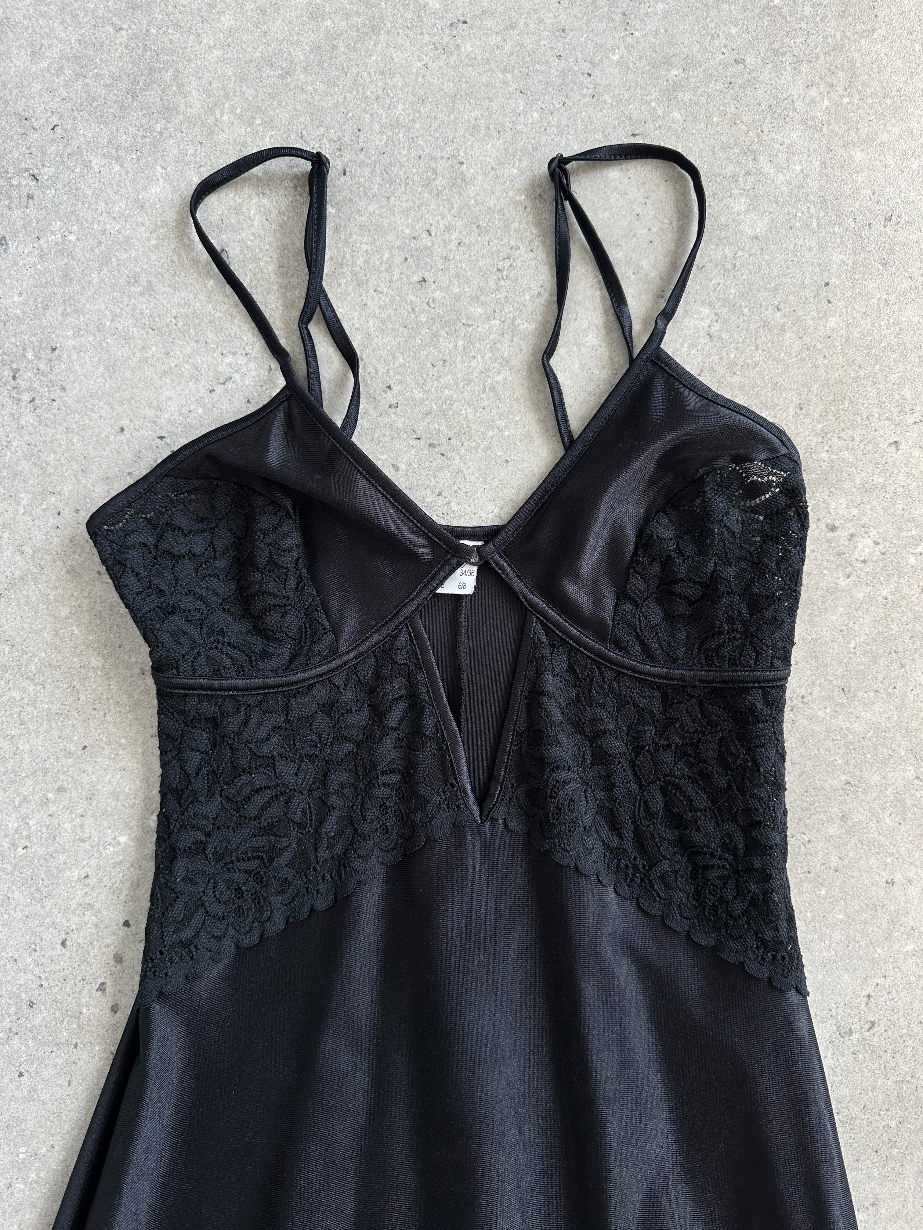 Vintage lace maxi slip dress in XS with delicate lace details and flowing silhouette, perfect for elegant casual wear.