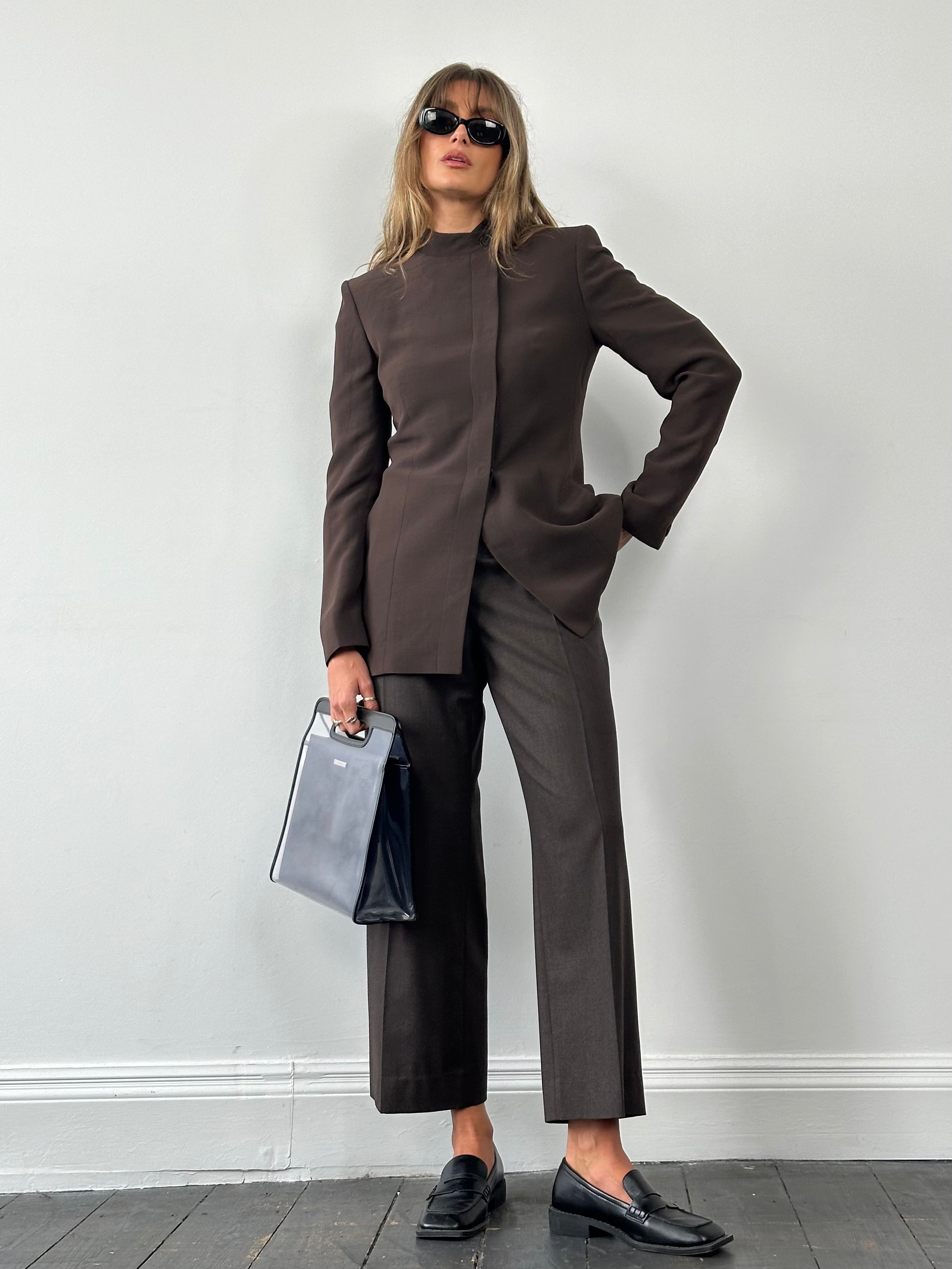Max Mara virgin wool tailored trousers with straight leg and low-mid rise, W32, shown in a neutral color.