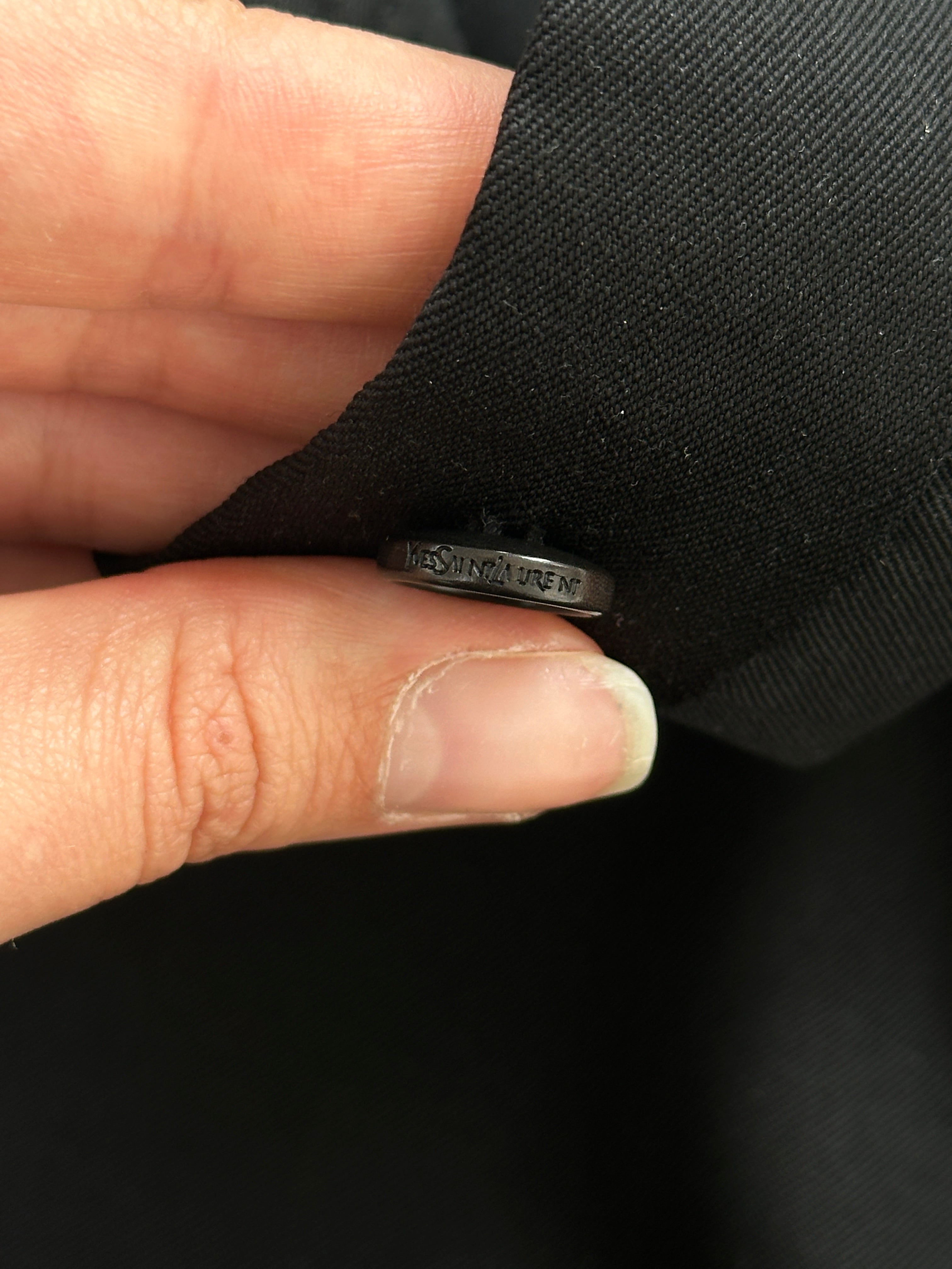 Yves Saint Laurent Pour Homme pure wool single-breasted suit in size 42R/W34, displayed on a hanger with front view.