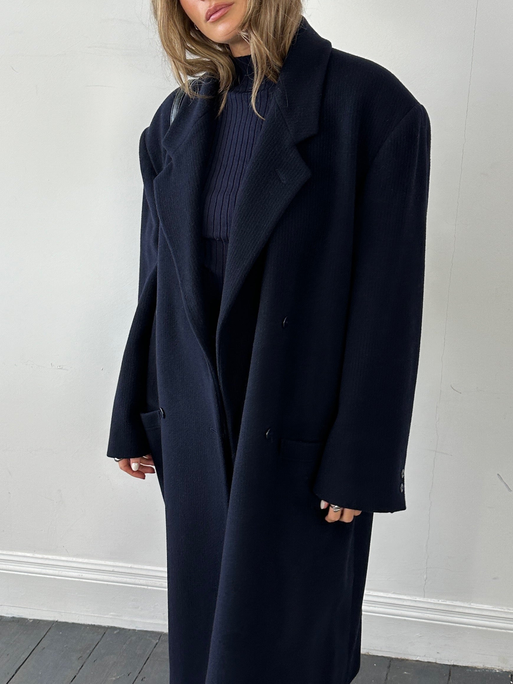 Versace wool cashmere double-breasted coat in XL, shown hanging with front view and classic design details.