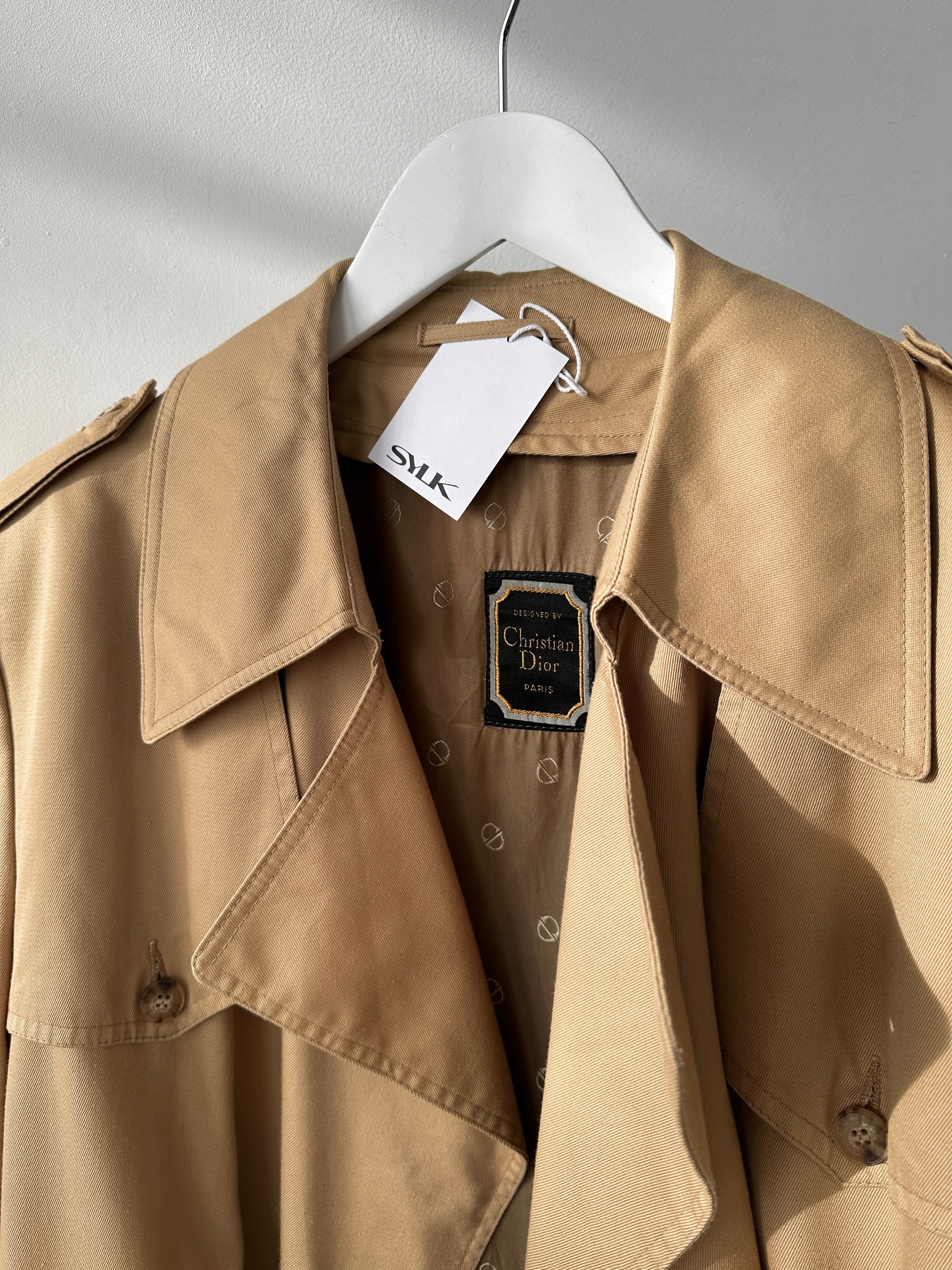 Christian Dior cotton double-breasted trench coat in size L/XL, stylish and tailored with classic design details.