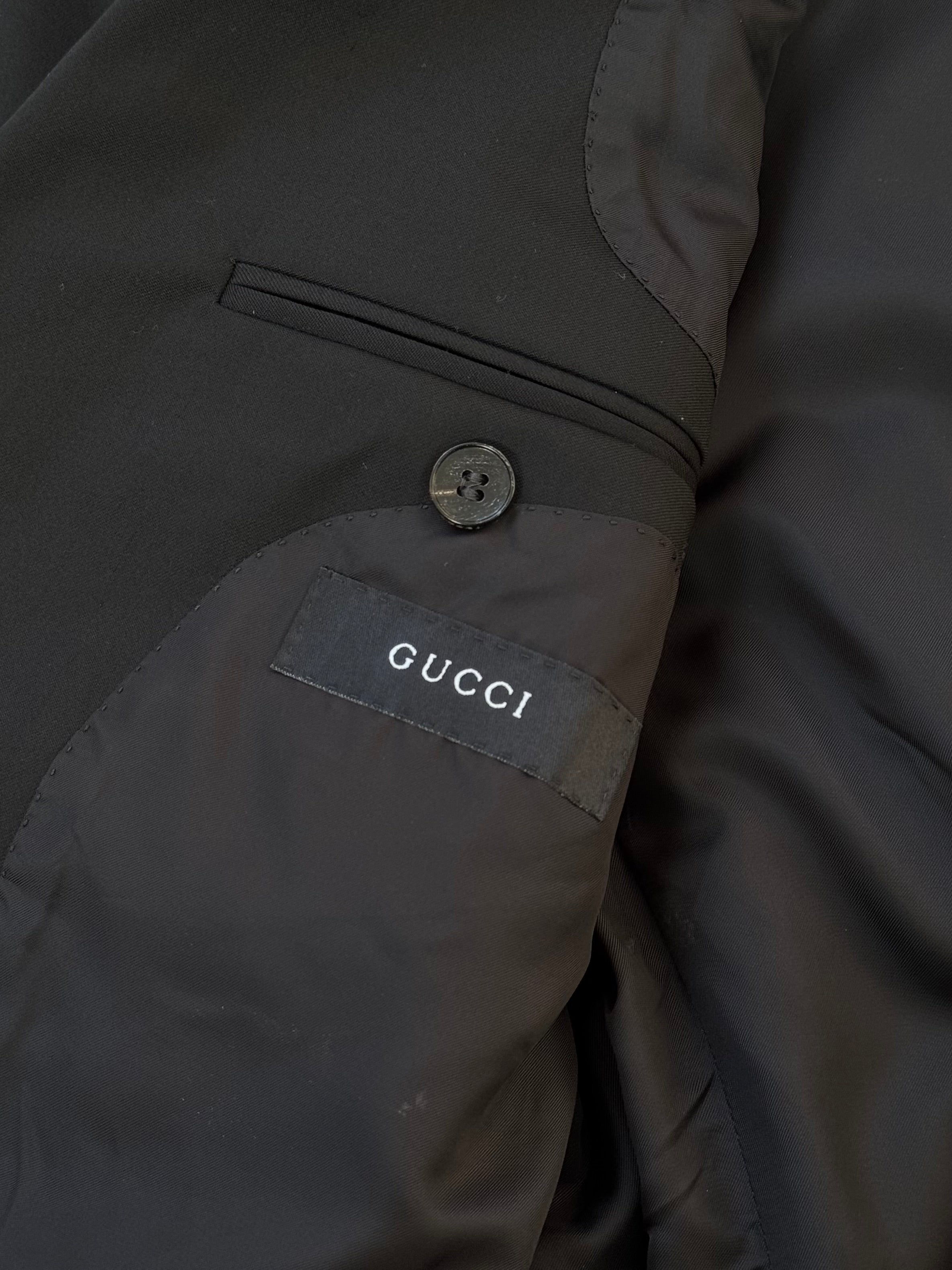 Gucci 1990s pure wool blazer with dagger collar, tailored fit, in size 38R/M, featuring classic design and structured silhouette.
