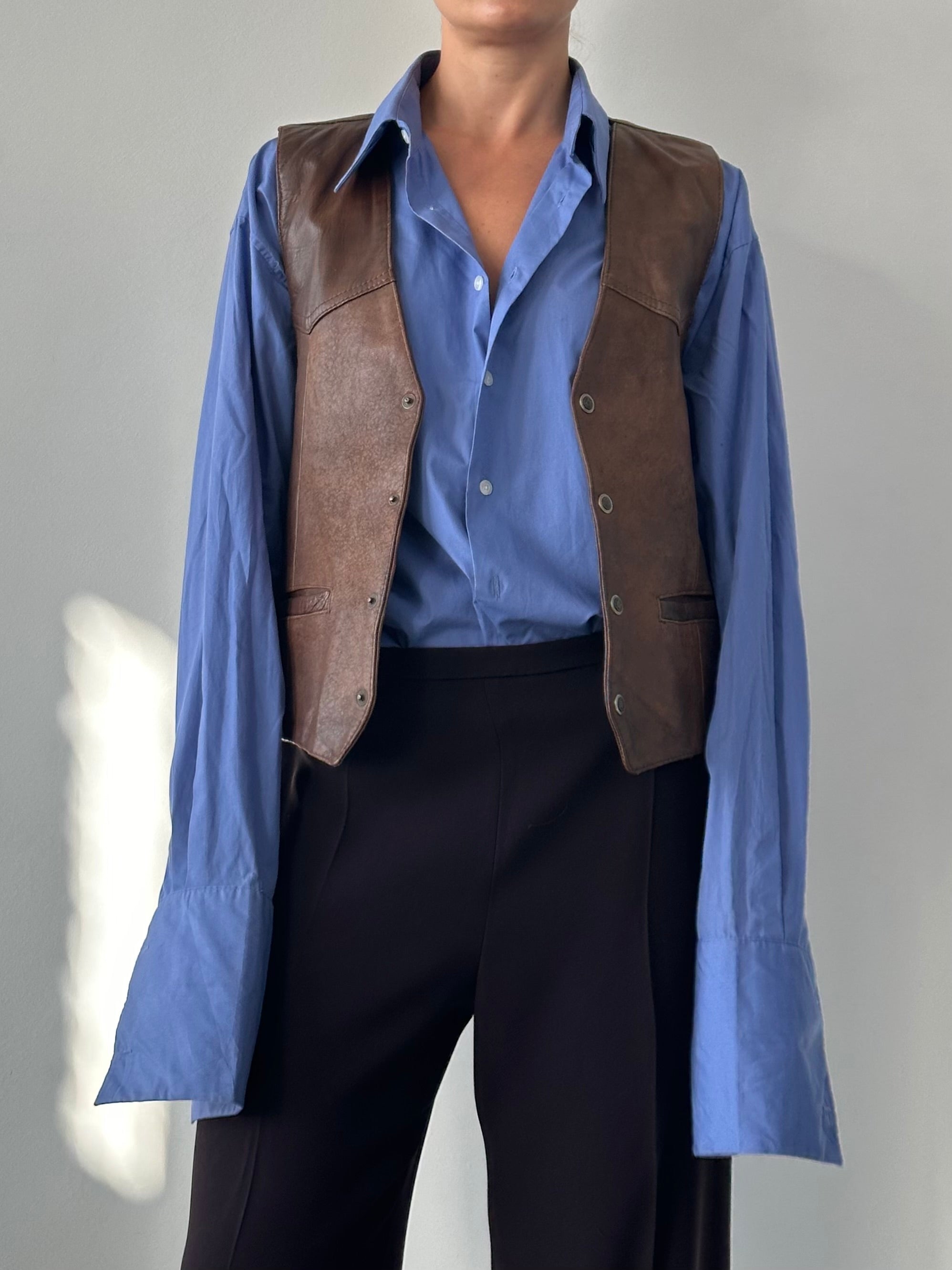 Vintage Italian vintage aged leather waistcoat, size large, showcasing classic craftsmanship and rich textured leather details.