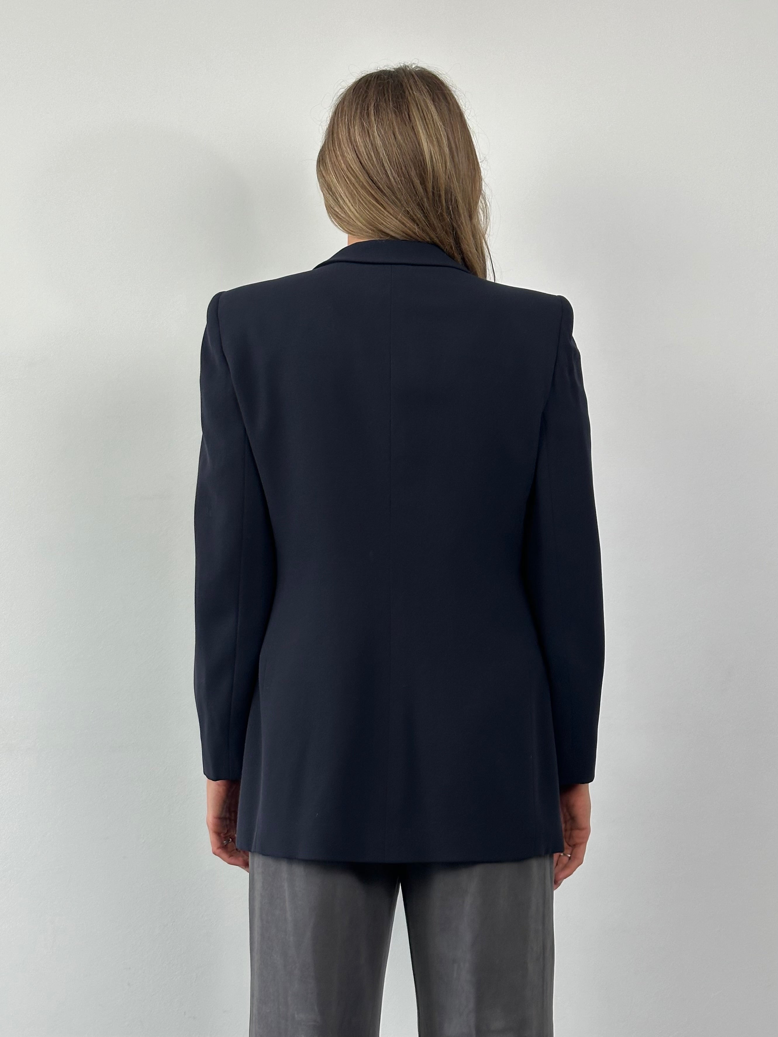 Giorgio Armani Black Label fitted wool blazer in black, showing front view with tailored lapels and classic style.