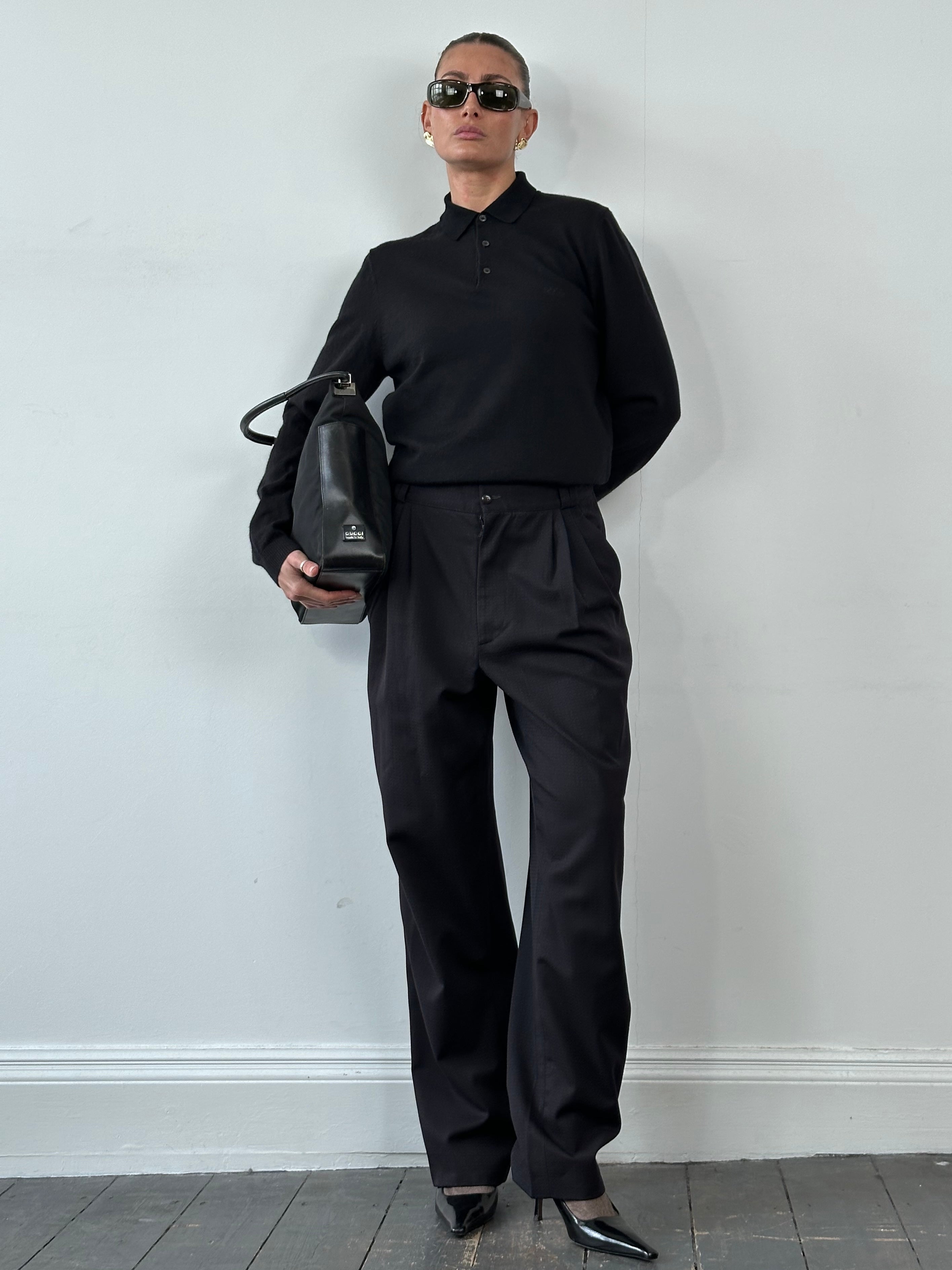 Gianni Versace 80s pure wool tapered leg tailored trousers in navy, front view showing fit and classic style.