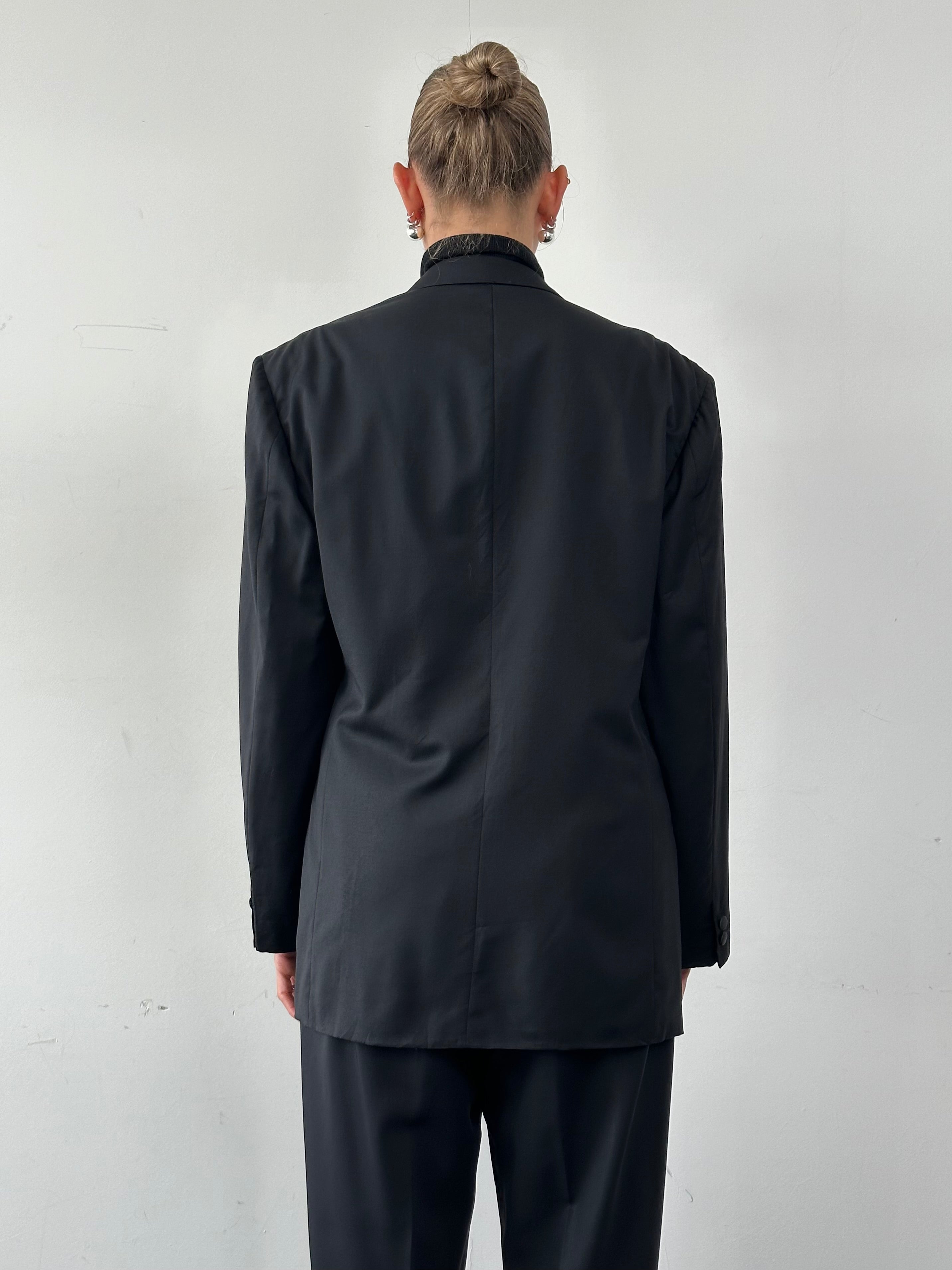 Giorgio Armani double-breasted blazer in size large/x-large, tailored men's tuxedo blazer with classic lapels and sleek design.
