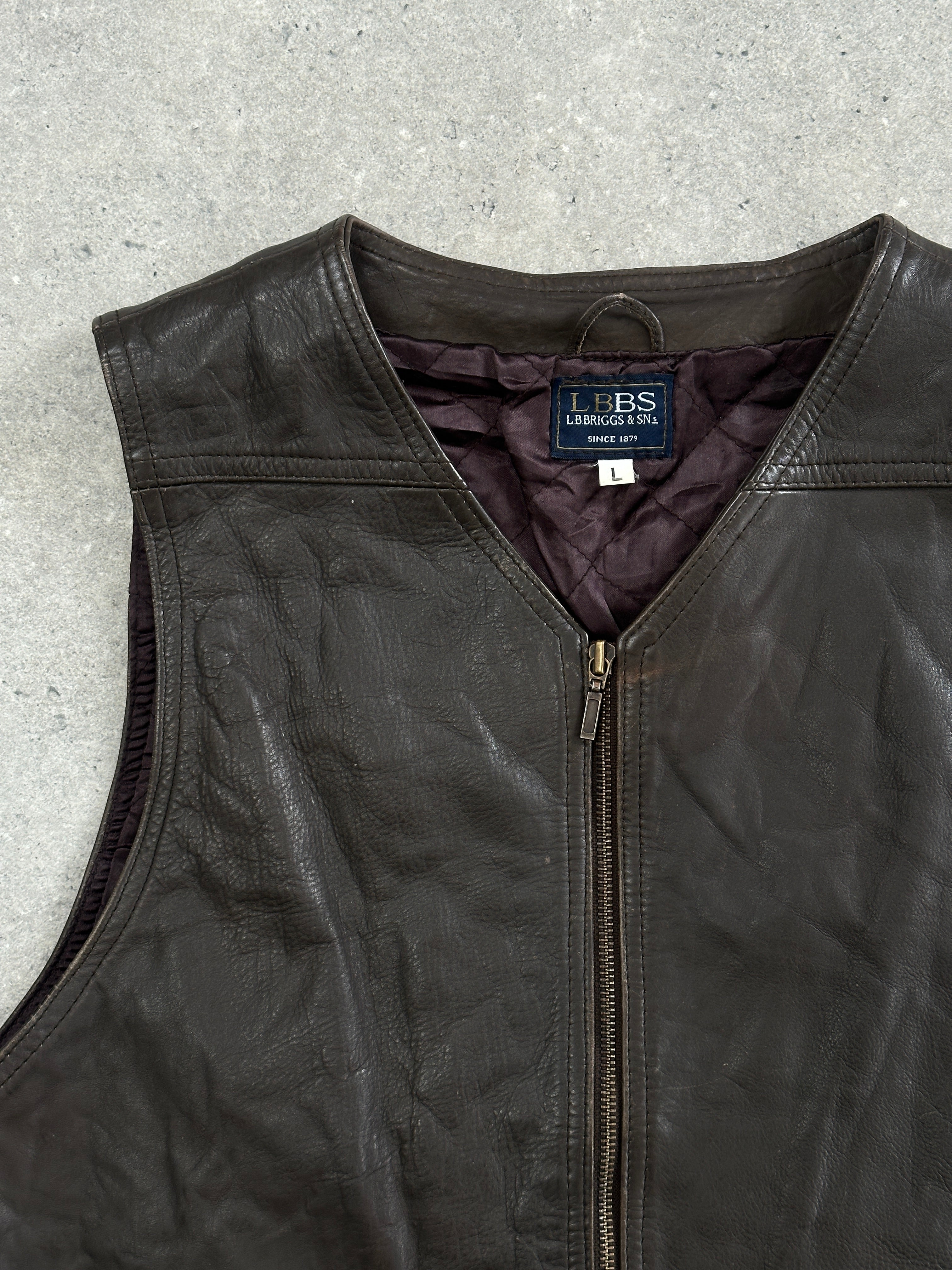 Vintage 1990s front zip leather waistcoat, size large, with classic 90s style and textured brown leather.