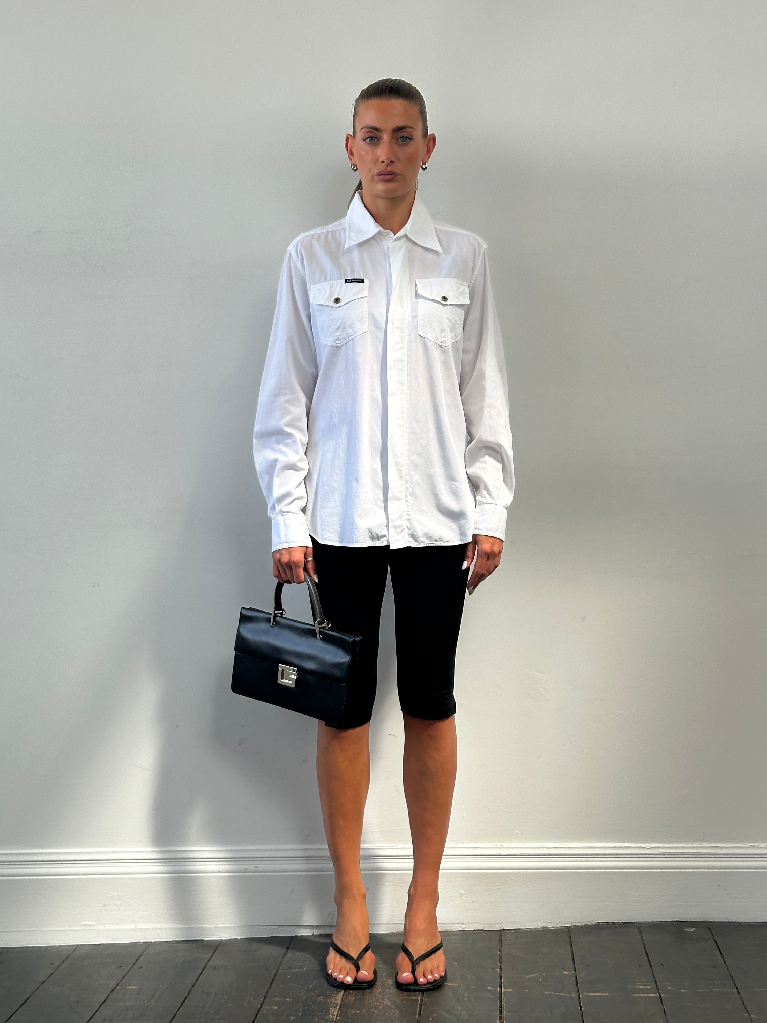 Dolce & Gabbana cotton shirt in size M/L, featuring a classic design with a crisp collar and button front.