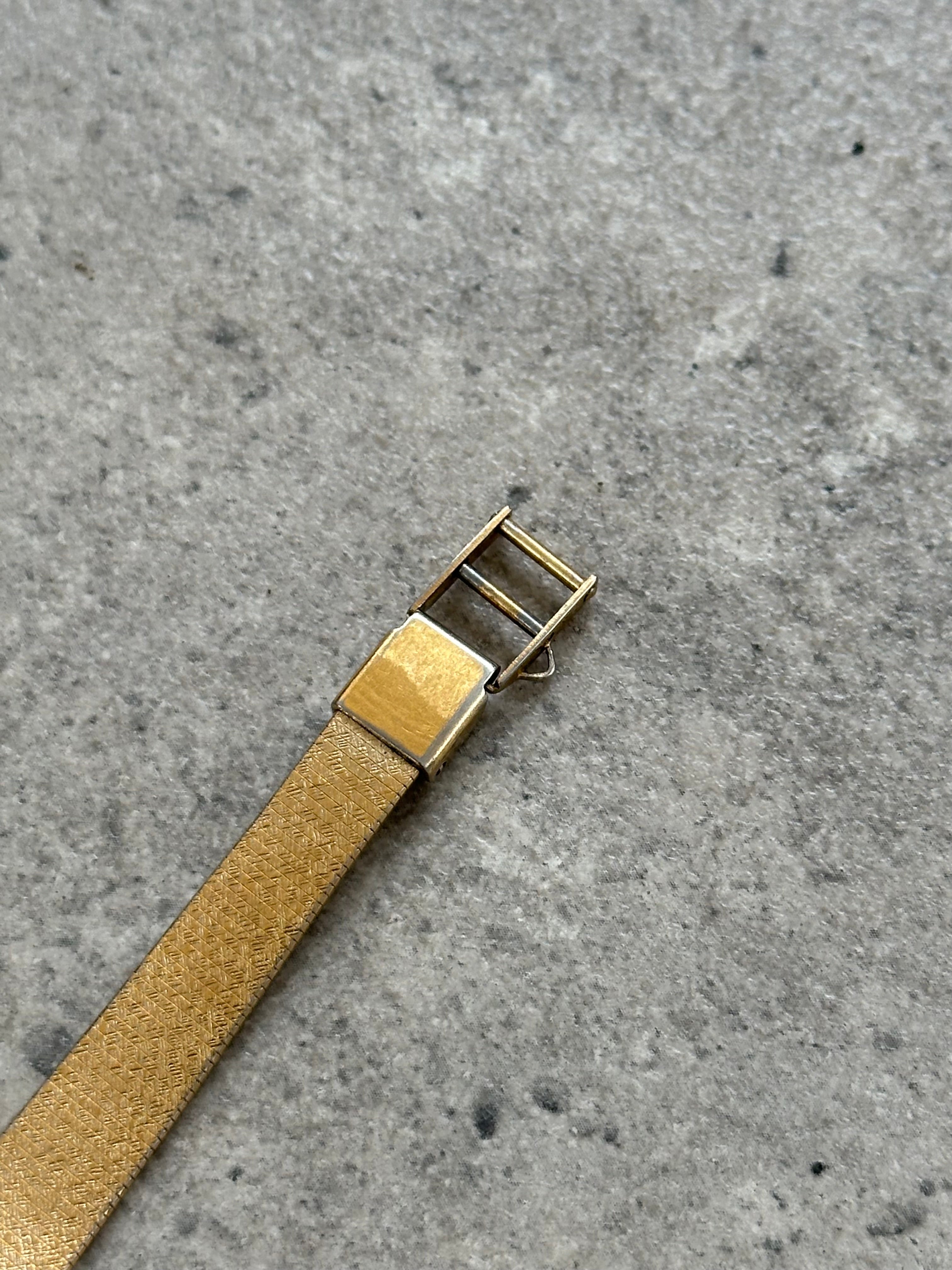 Accurist 1990s gold tone octagonal quartz watch with a sleek design and classic style.