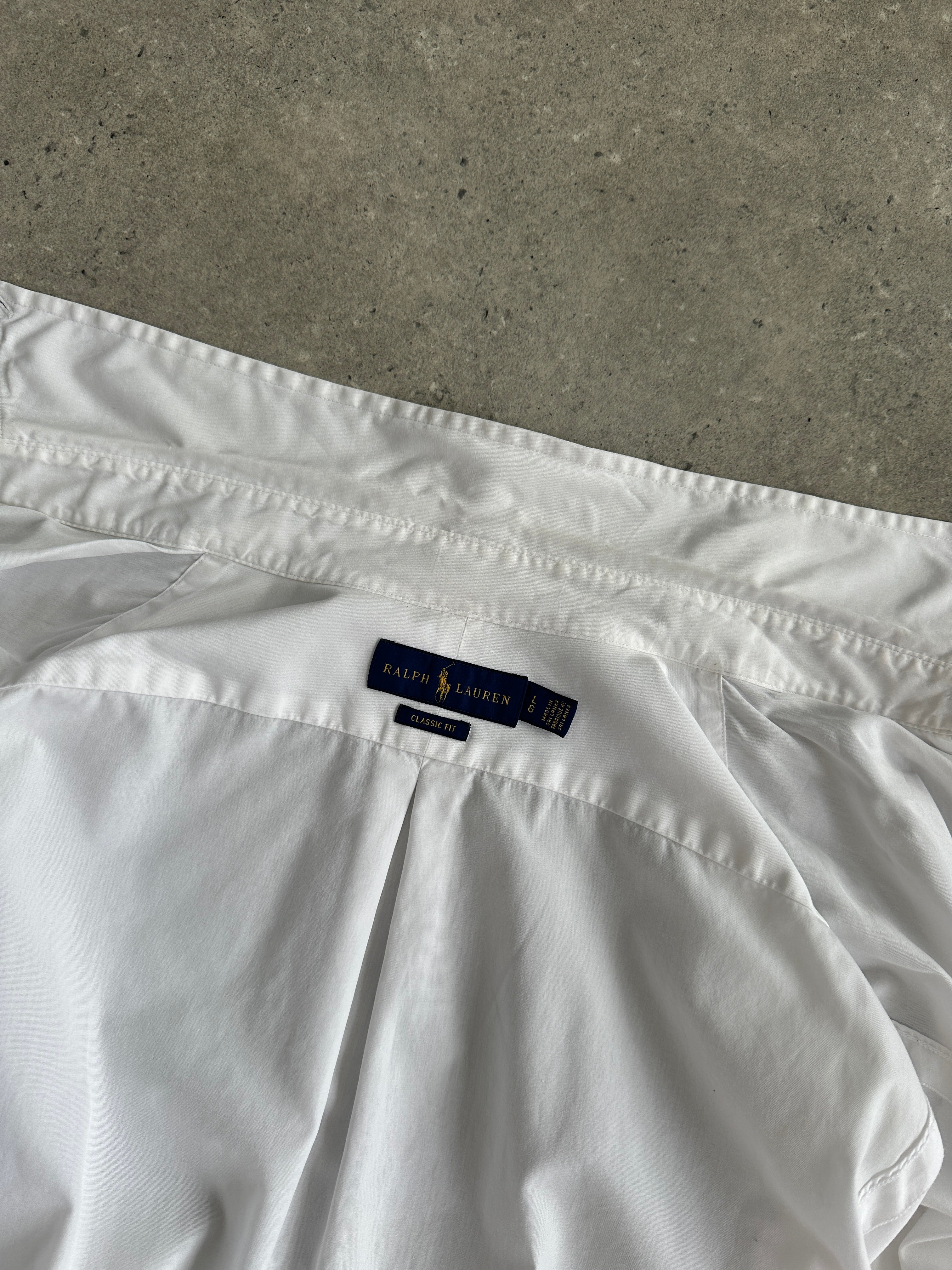 Ralph Lauren cotton logo shirt in size large, featuring a classic fit with the iconic Ralph Lauren polo logo on the chest.