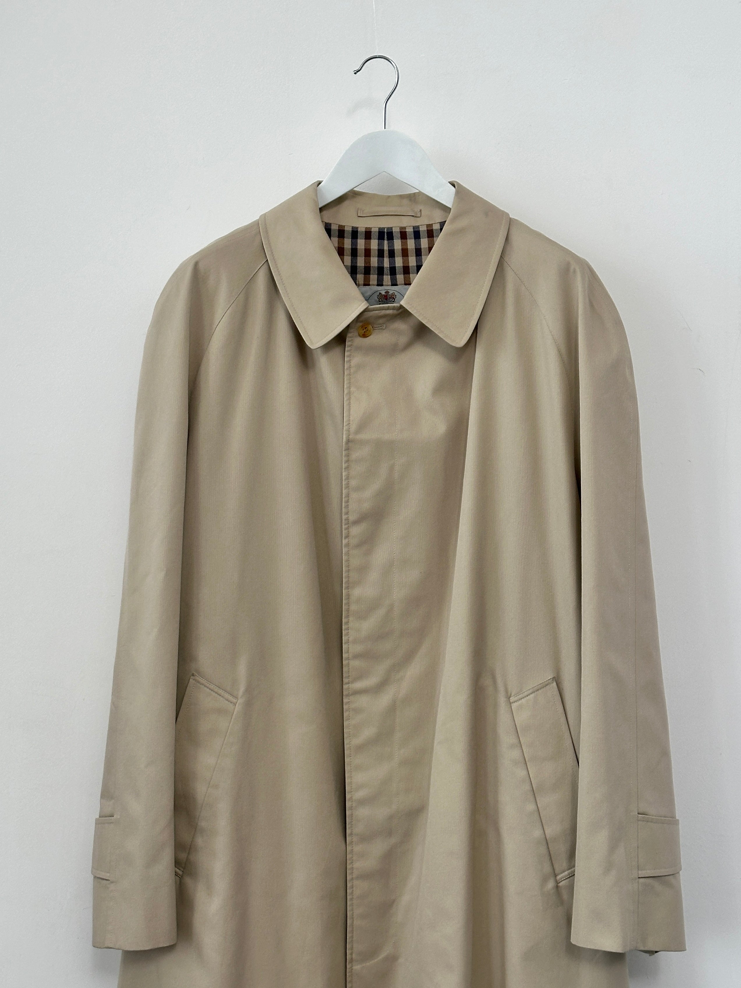 Aquascutum men's cotton trench coat with concealed placket in XXL, classic beige color, showing front view and button details.