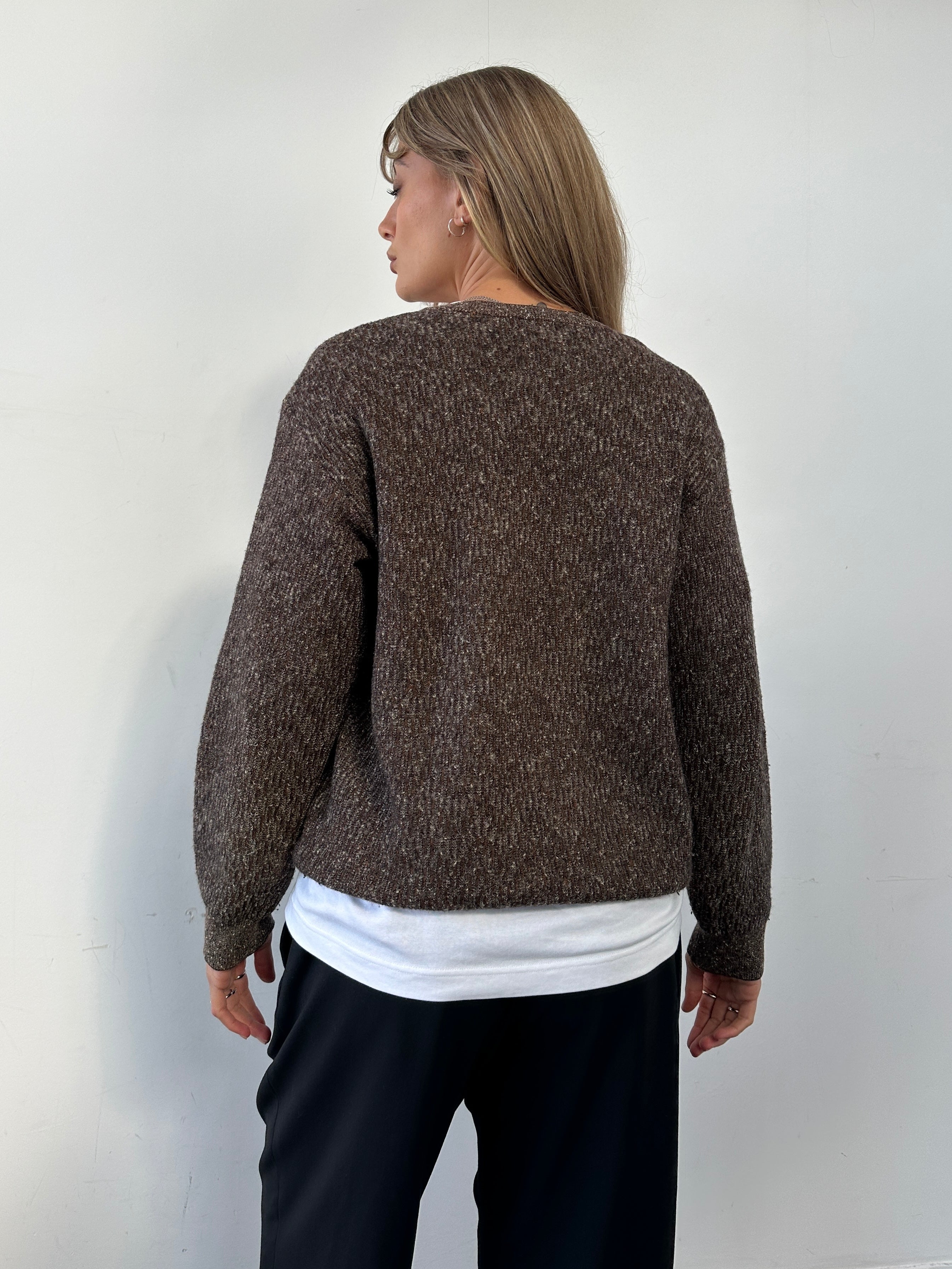 Missoni V neck wool knit jumper in size M, featuring colorful zigzag pattern and cozy, soft texture.