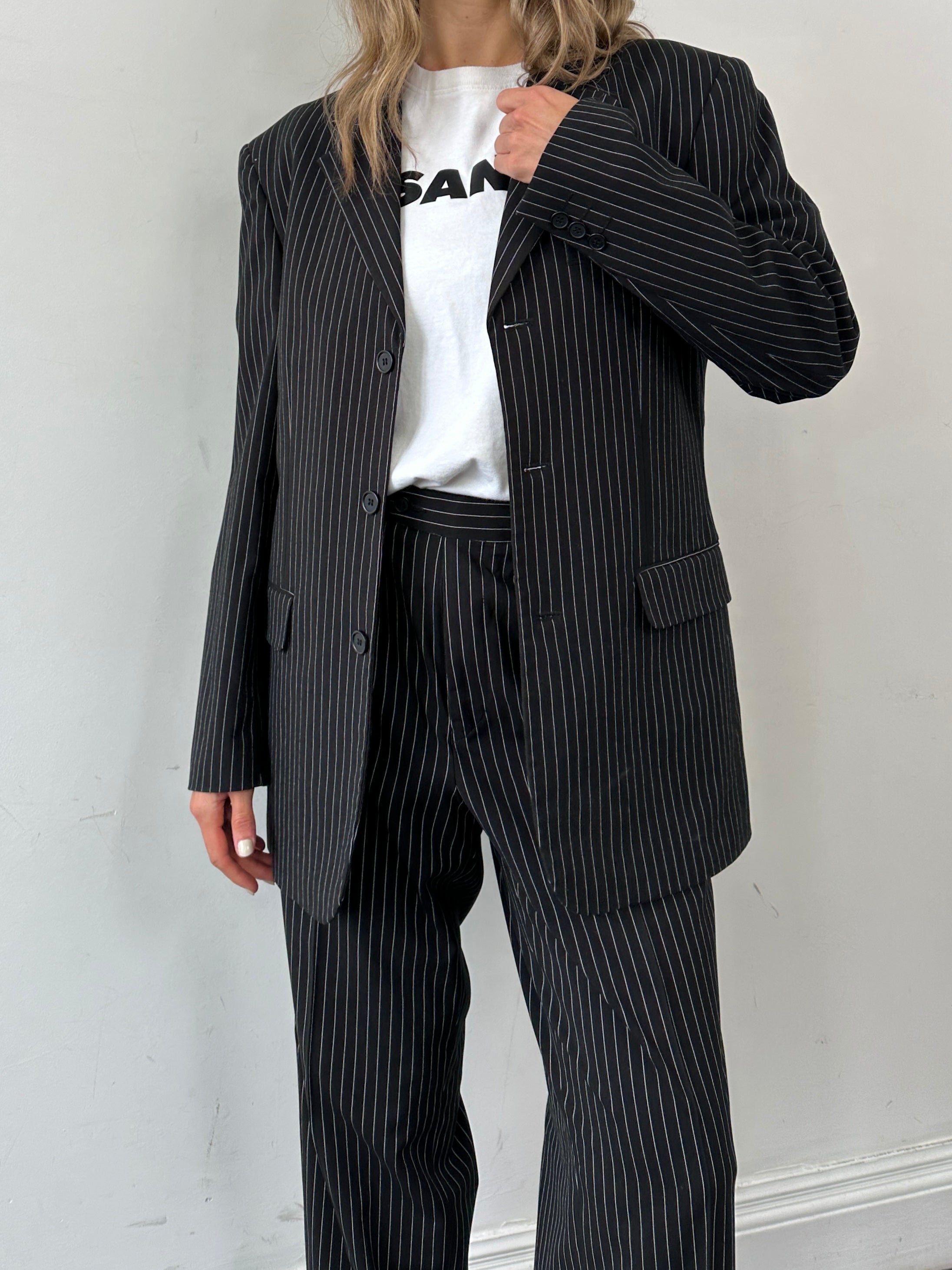 Vintage pinstripe single-breasted suit jumpsuit in size 40R/W36, featuring a tailored fit and classic pinstripe pattern.