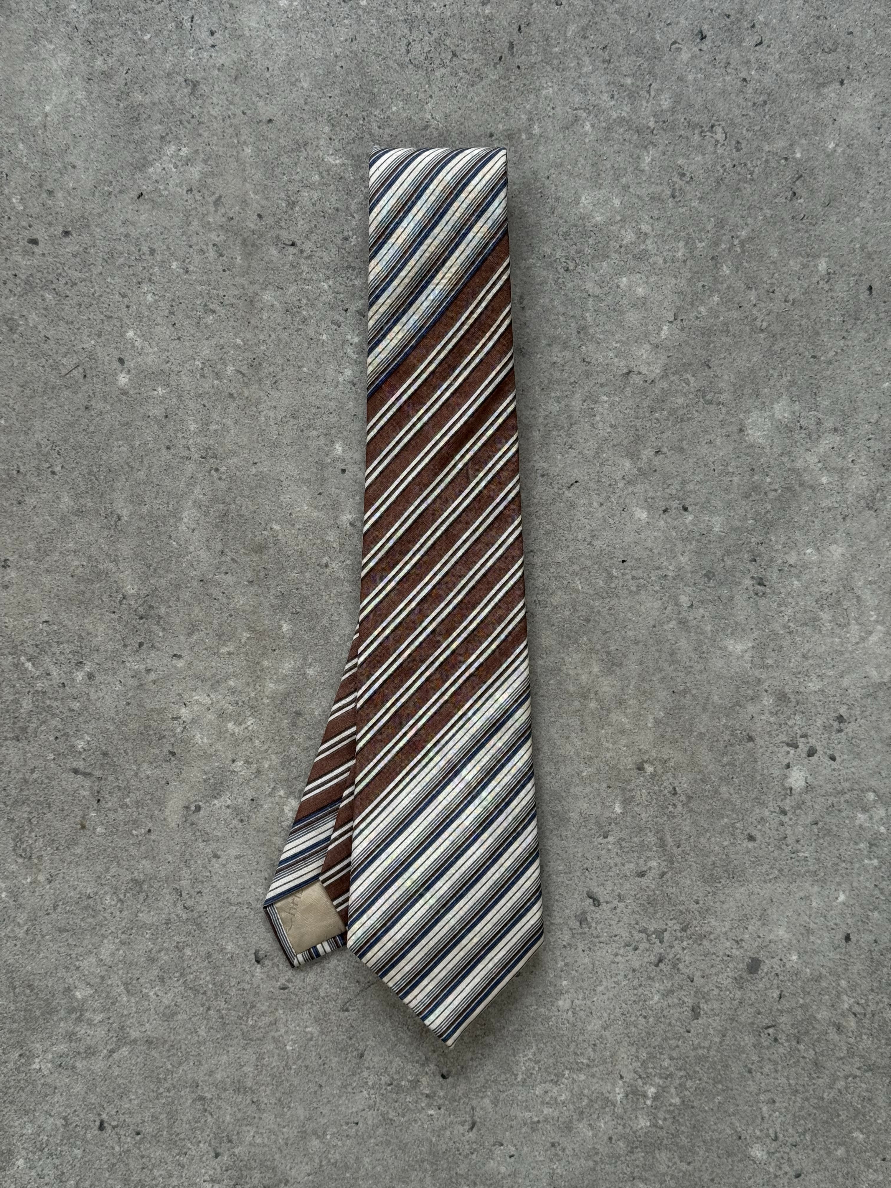Christian Dior Monsieur 1990s pure silk striped tie, showing the elegant design and fabric detail in a close-up image.