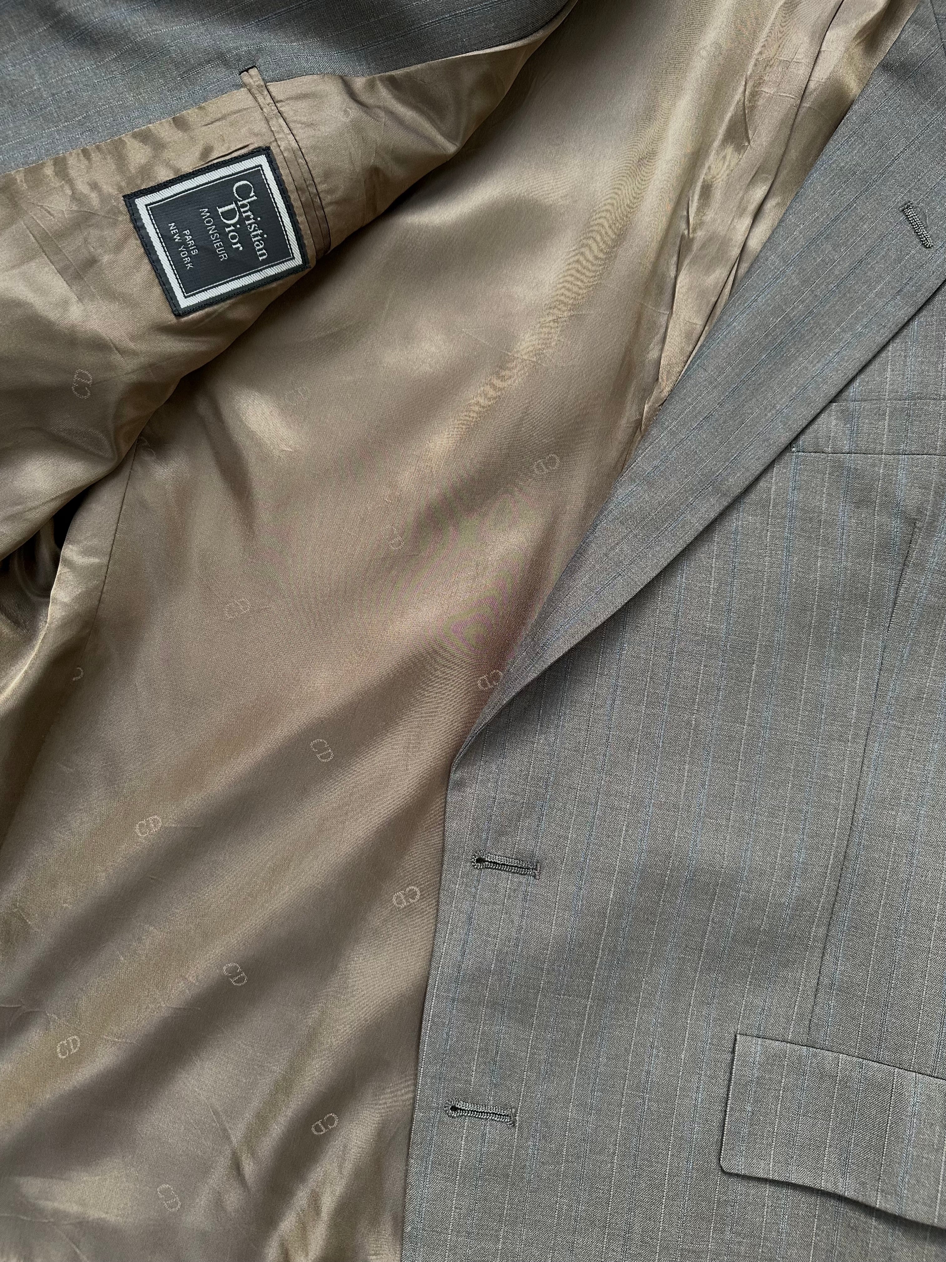 Christian Dior Monsieur 1990s striped single-breasted blazer in size 44R/XL, featuring classic tailored design and bold stripe pattern.