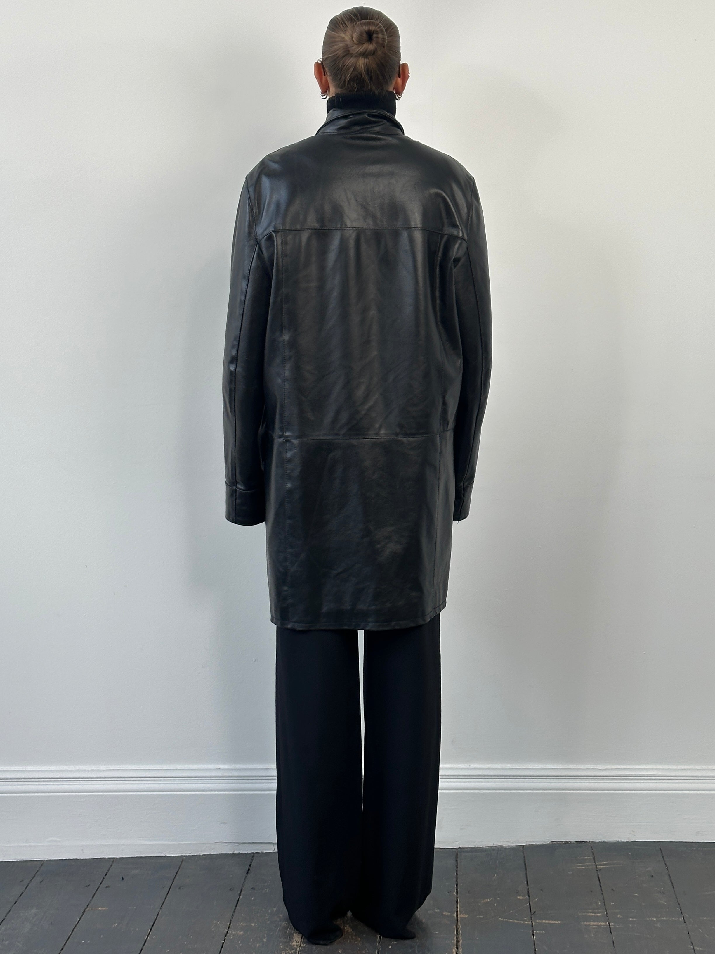 Vintage Italian 1990s leather trench coat with funnel neck, oversized fit, stylish leather jacket in classic design.
