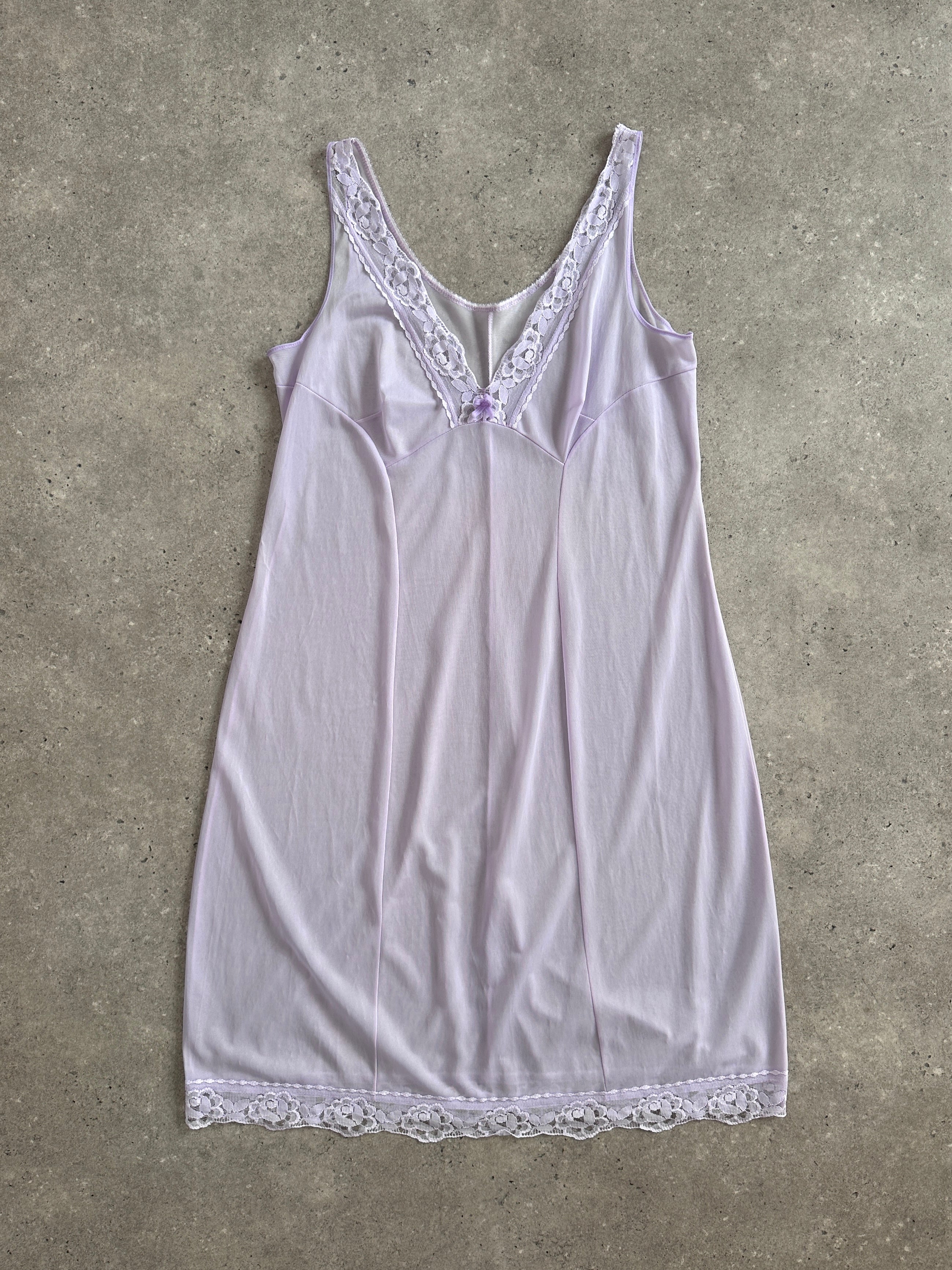Vintage 2000s lace sheer midi slip dress in size large, featuring delicate lace fabric and a classic vintage style.