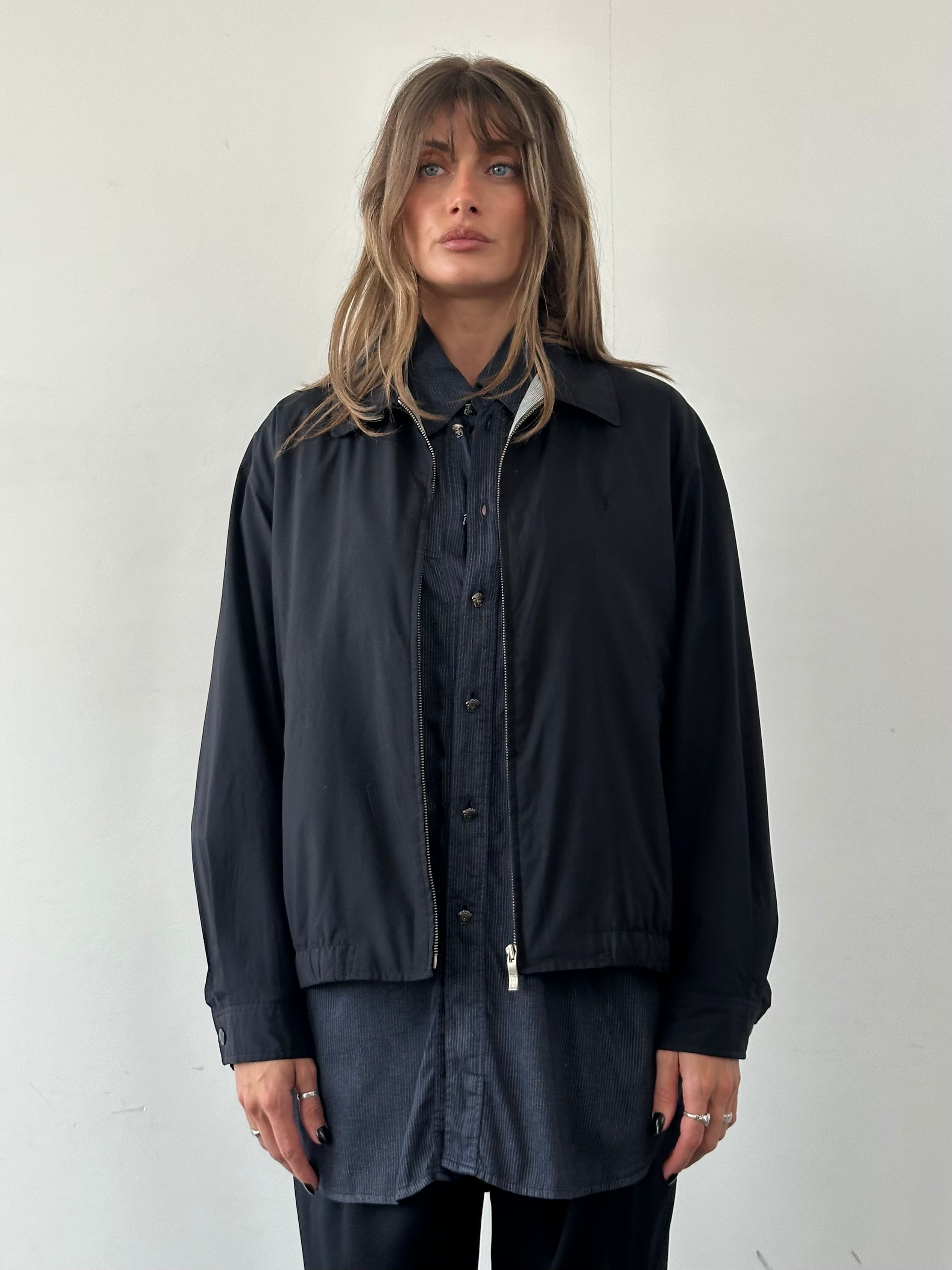 Yves Saint Laurent Pour Homme logo bomber jacket in black, M/L size, with front zipper and signature branding details.