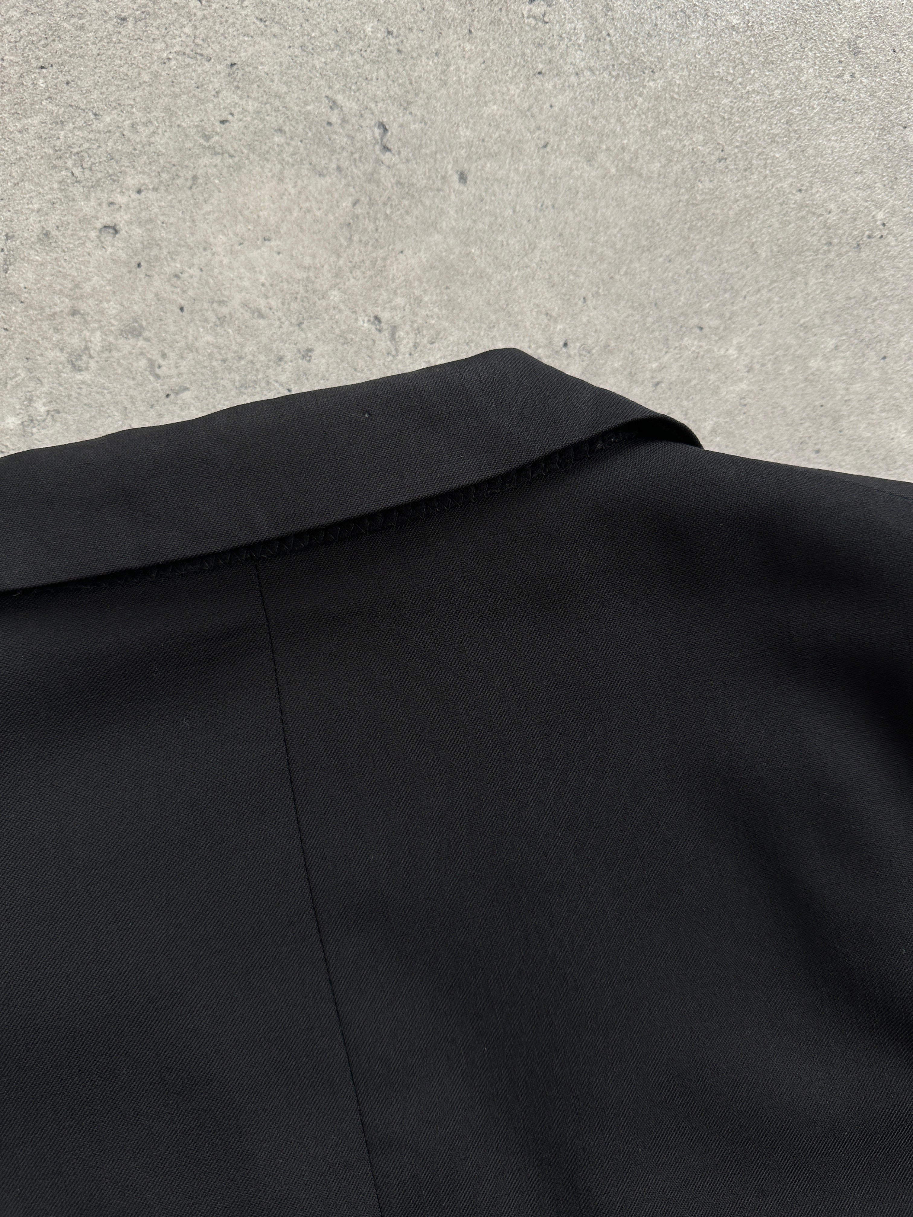 Yves Saint Laurent Pour Homme 1990s bespoke pure wool blazer in size 42R/XL, tailored with buttons and classic design.