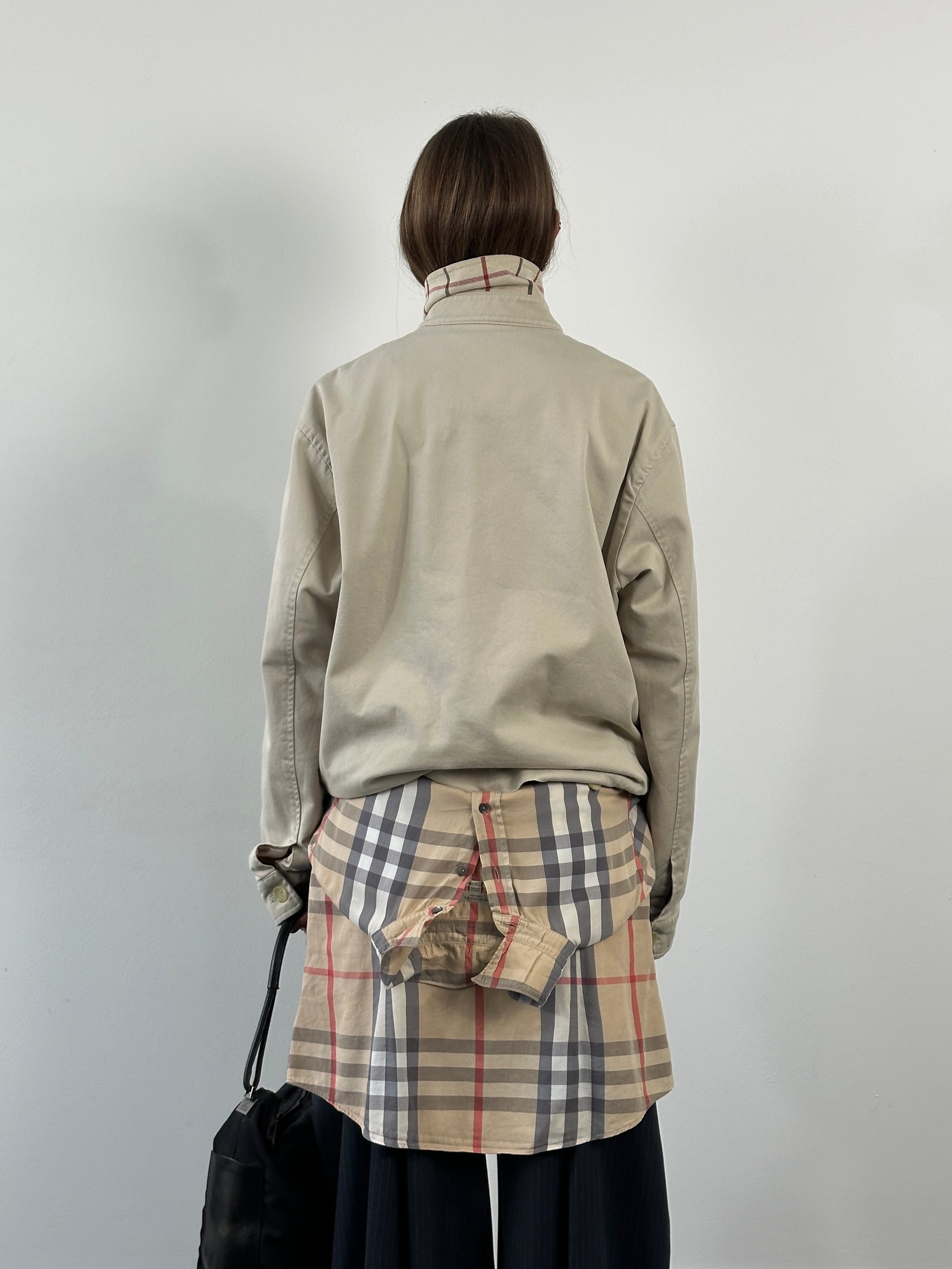 Burberry Thomas Burberry 1990s cotton Harrington bomber jacket in XL, shows beige fabric, classic collar, and front zipper closure.