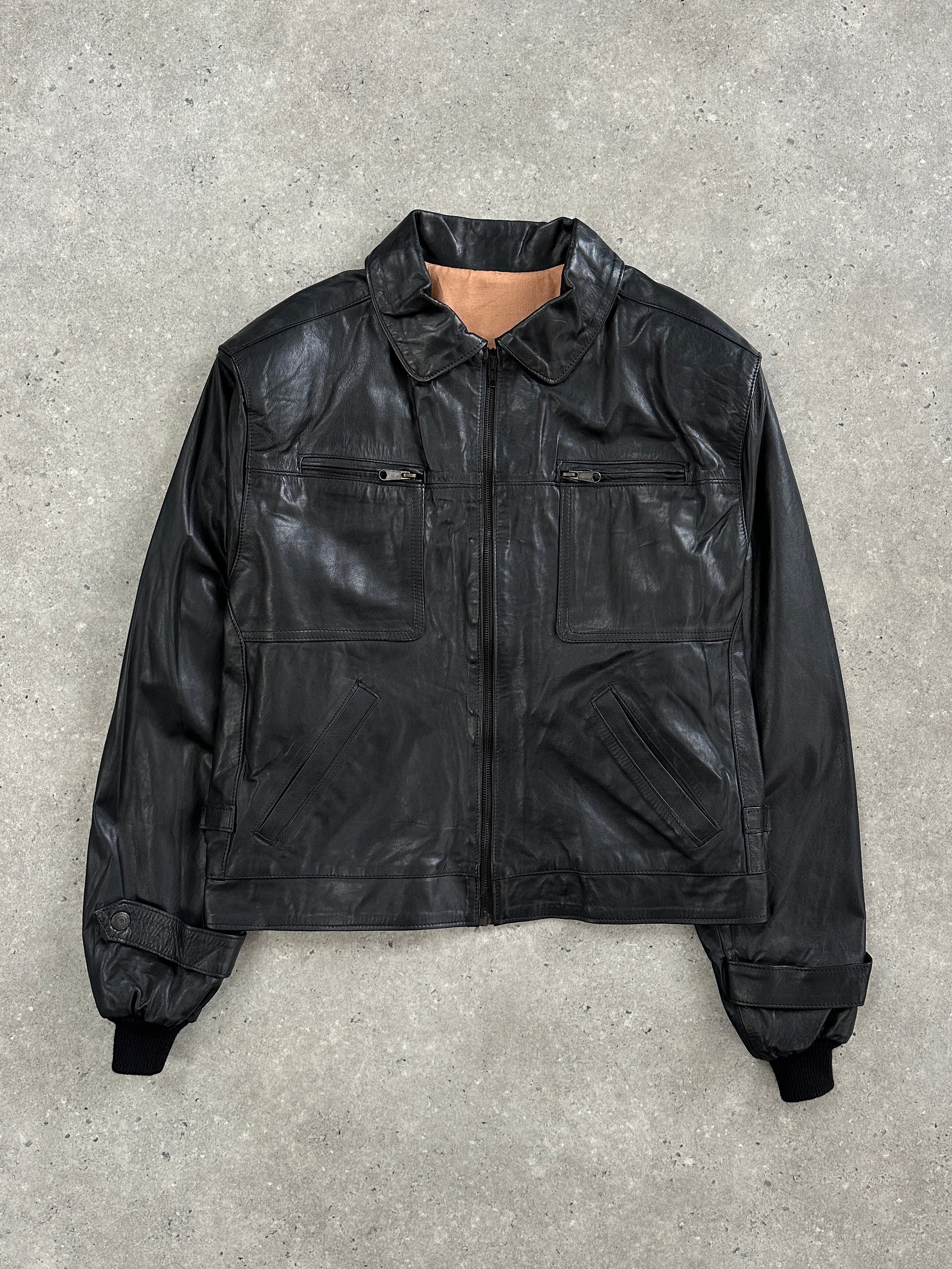 Vintage 1990s boxy cropped leather jacket, size large, featuring a classic design with a structured fit and authentic leather texture.