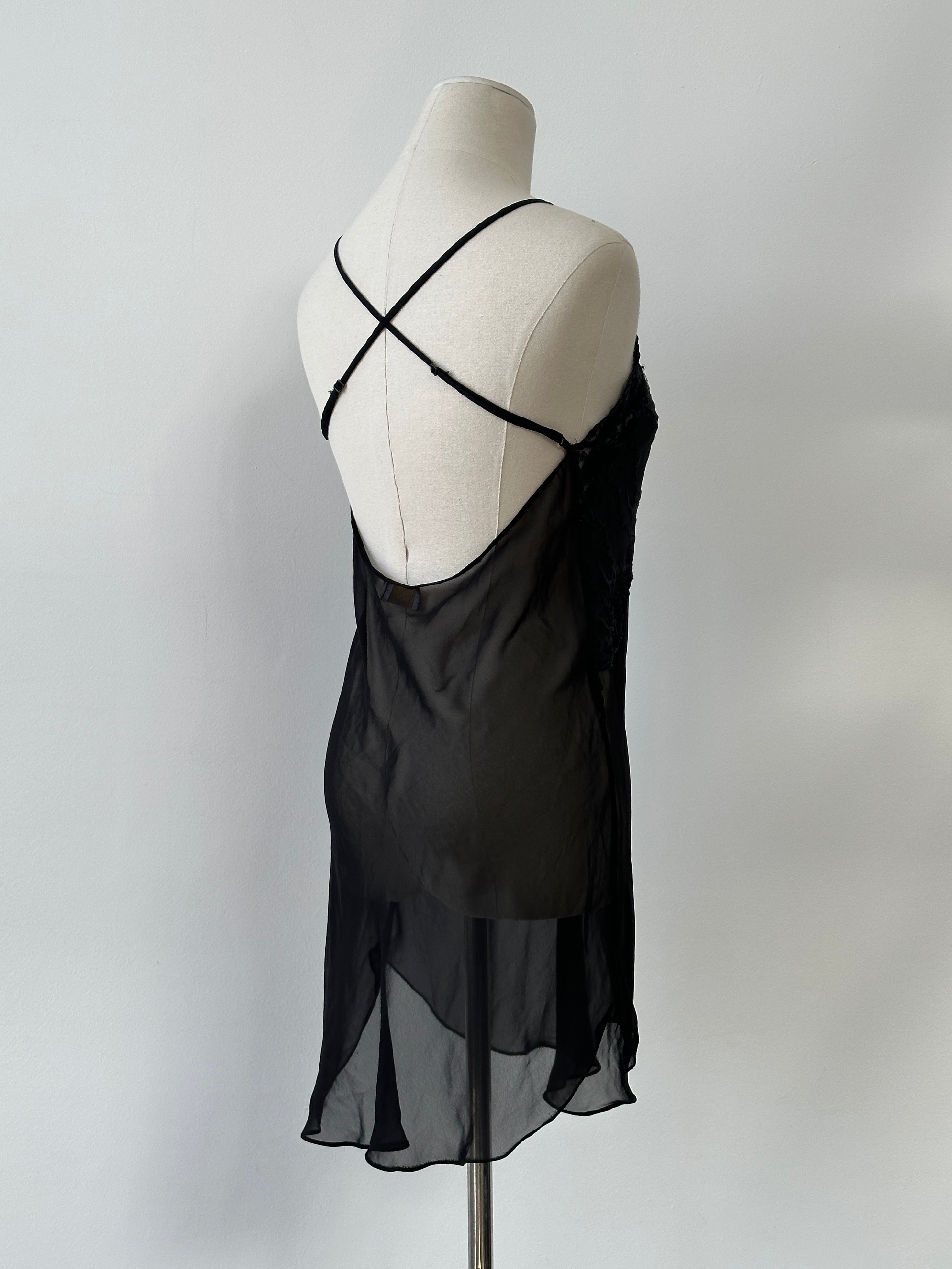 Vintage 2000s sheer mini slip dress in size S-M, featuring lightweight fabric and a classic vintage style.