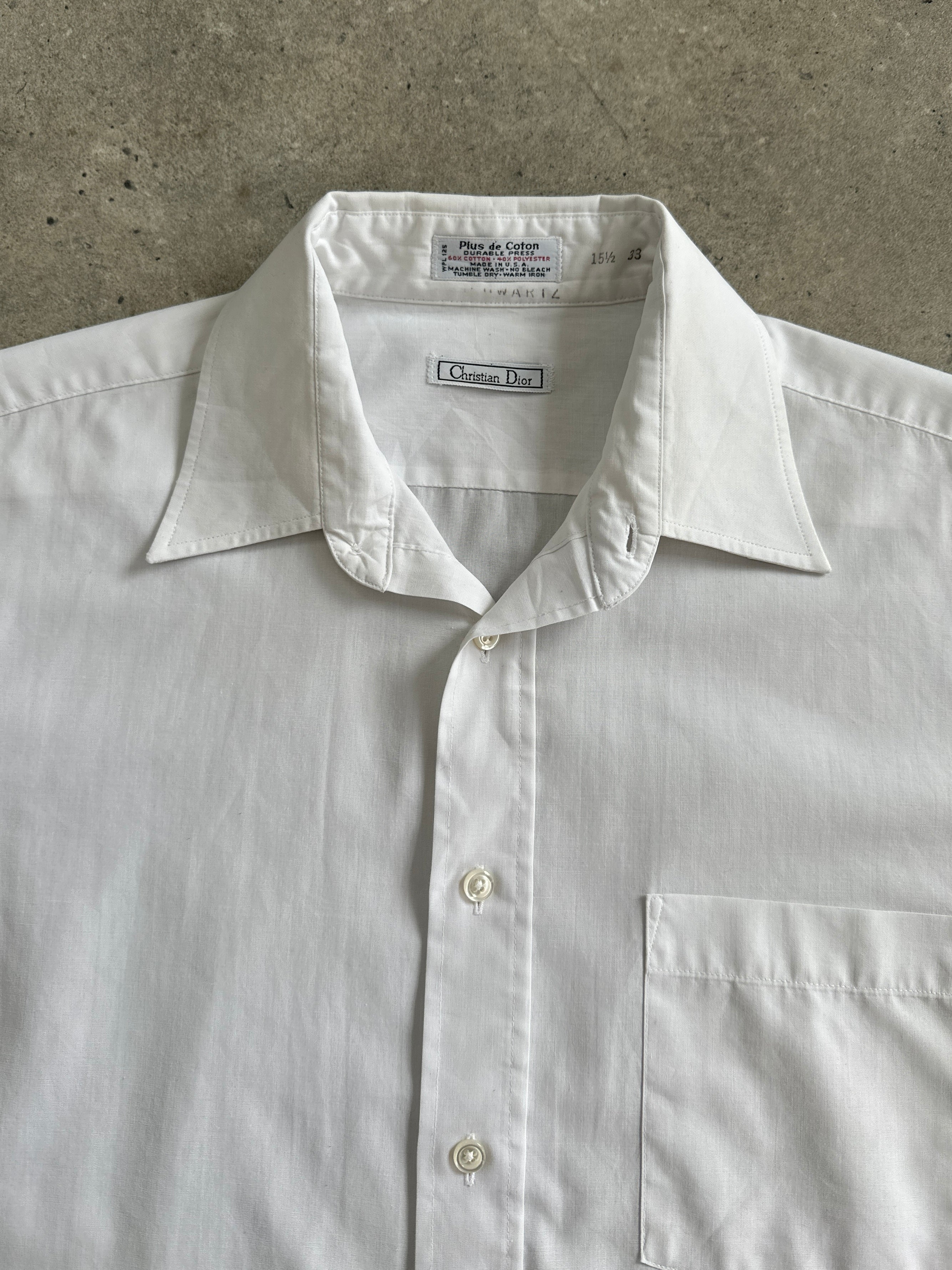 Christian Dior cotton dress shirt in size L, featuring a classic white design with a pointed collar and button-front closure.