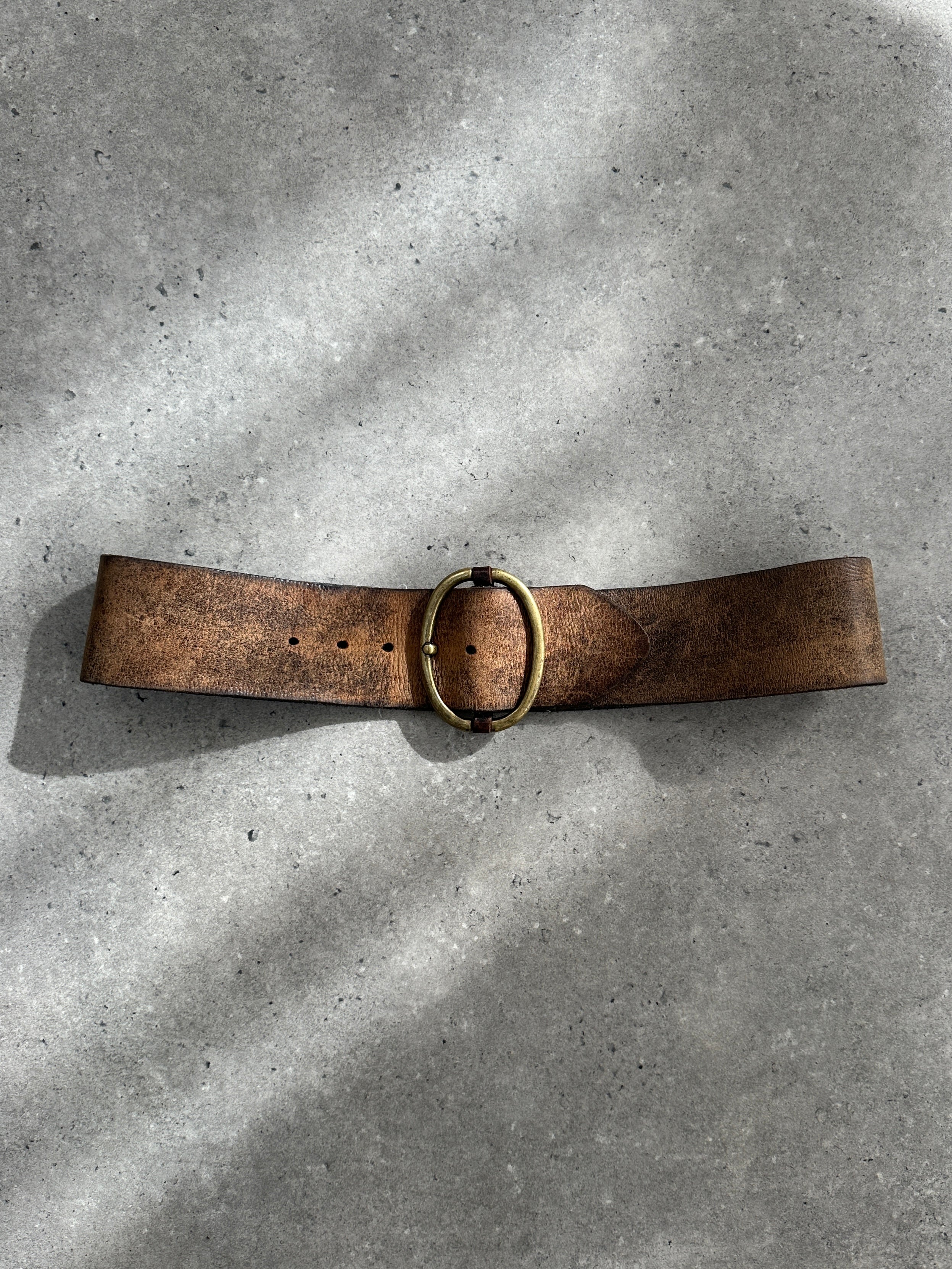 Vintage 1980s chunky leather belt with silver buckle, W31-35, featuring distressed brown leather and retro style.