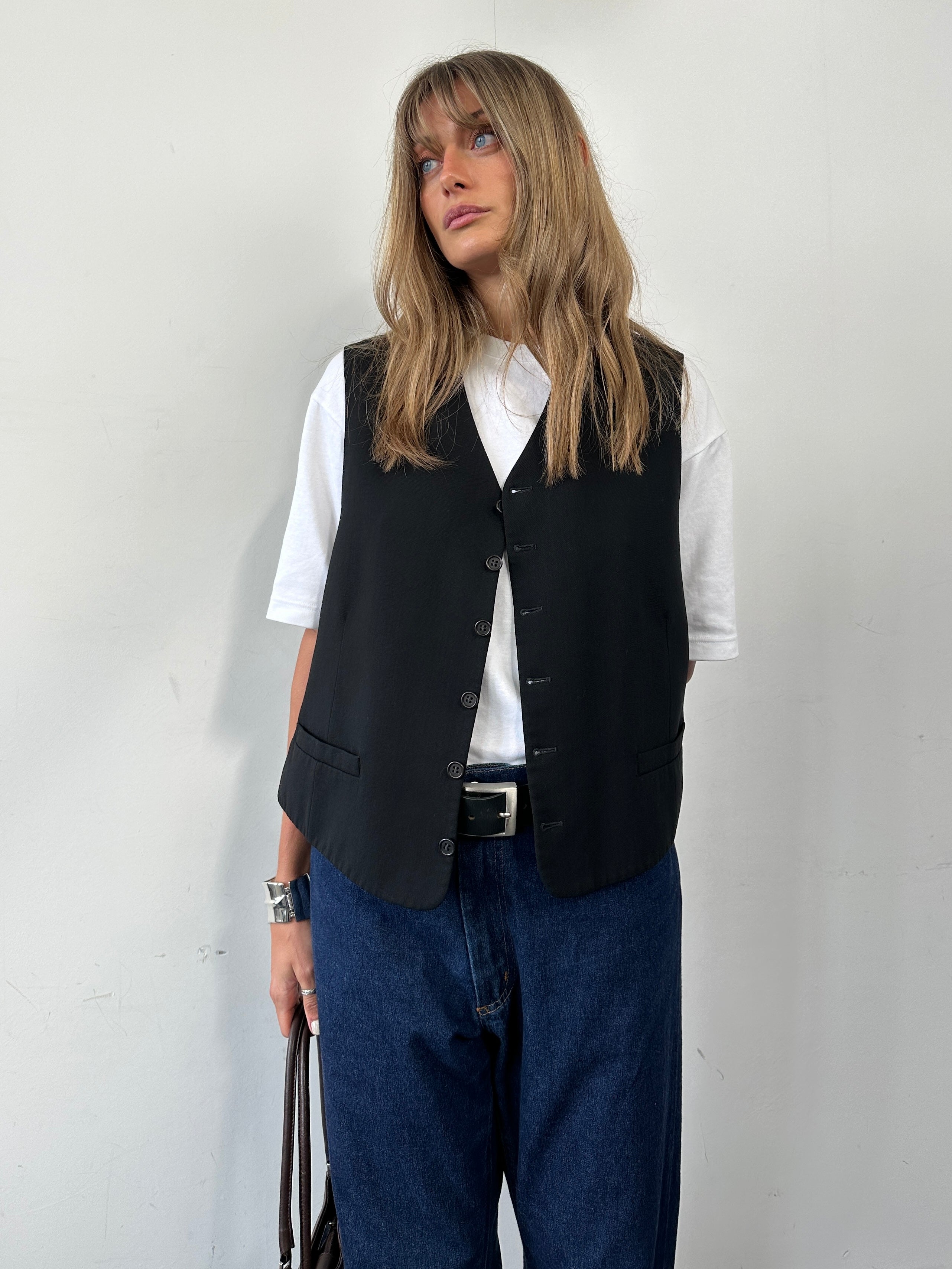 Yves Saint Laurent Pour Homme pure wool tailored waistcoat in size 42R/L, front view showing classic design and fine craftsmanship.