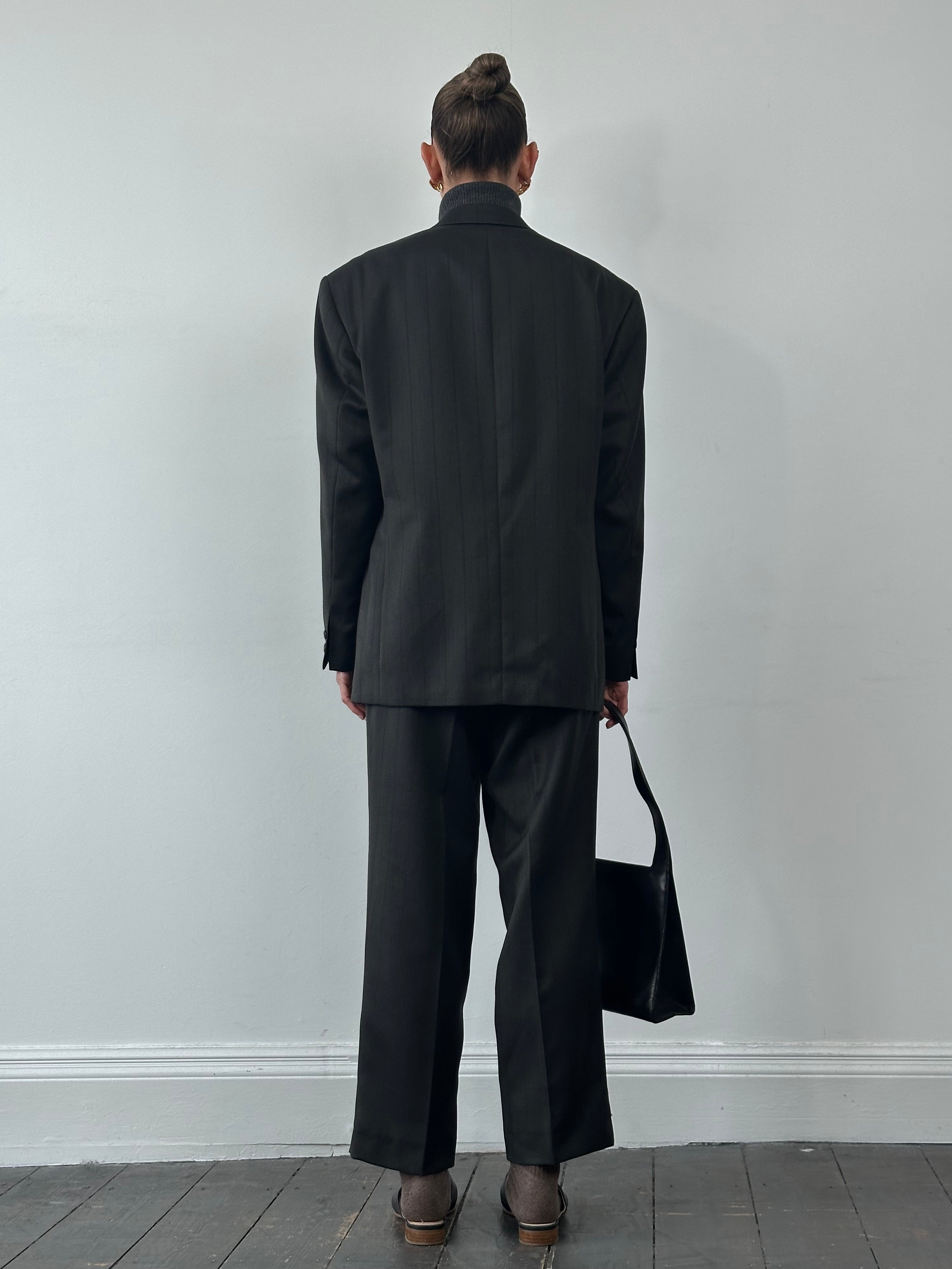 Vintage wool pinstripe double-breasted suit in size 44R/W34, featuring classic tailored fit and vintage style.