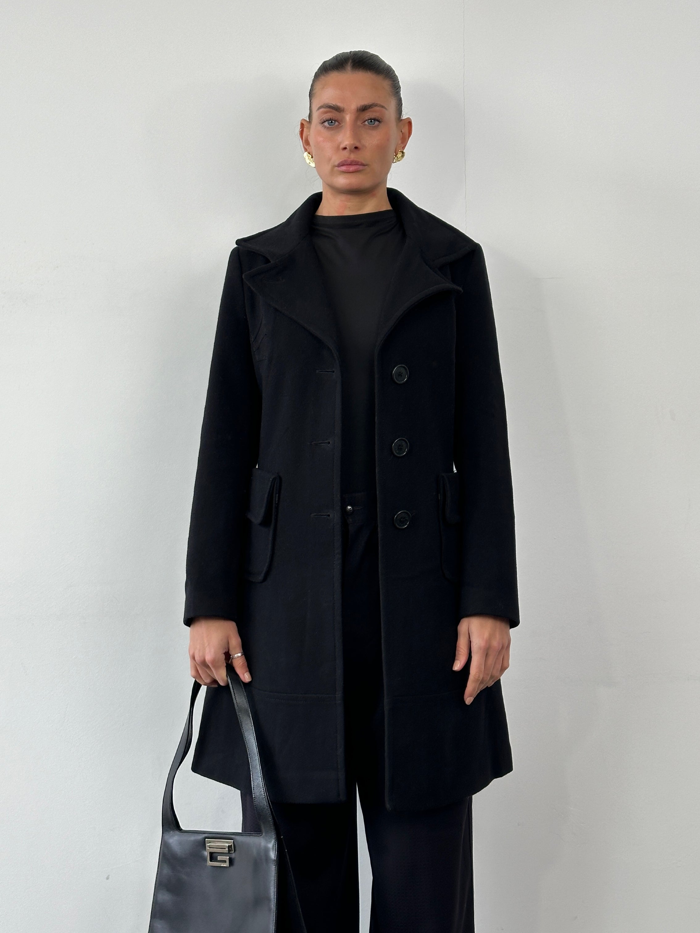 Max & Co virgin wool single-breasted coat in size S, shown on a hanger, featuring classic lapels and a tailored fit.
