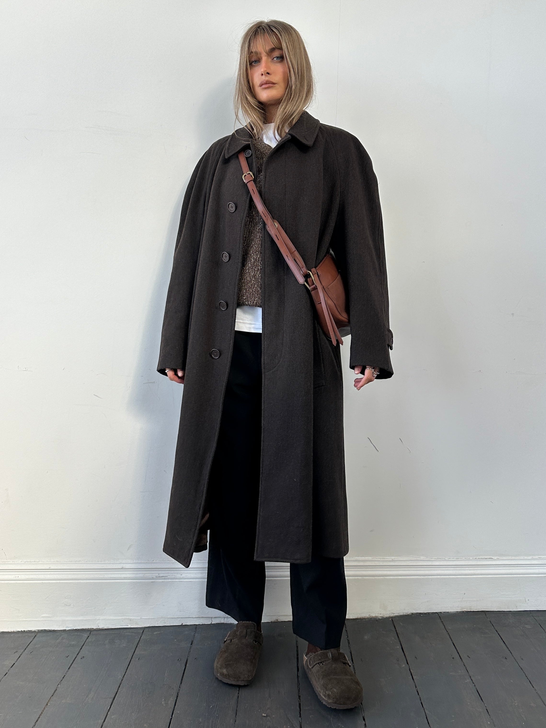 Giorgio Armani Le Collezioni wool coat with concealed placket, in XL size, shown on a hanger with a neutral background.