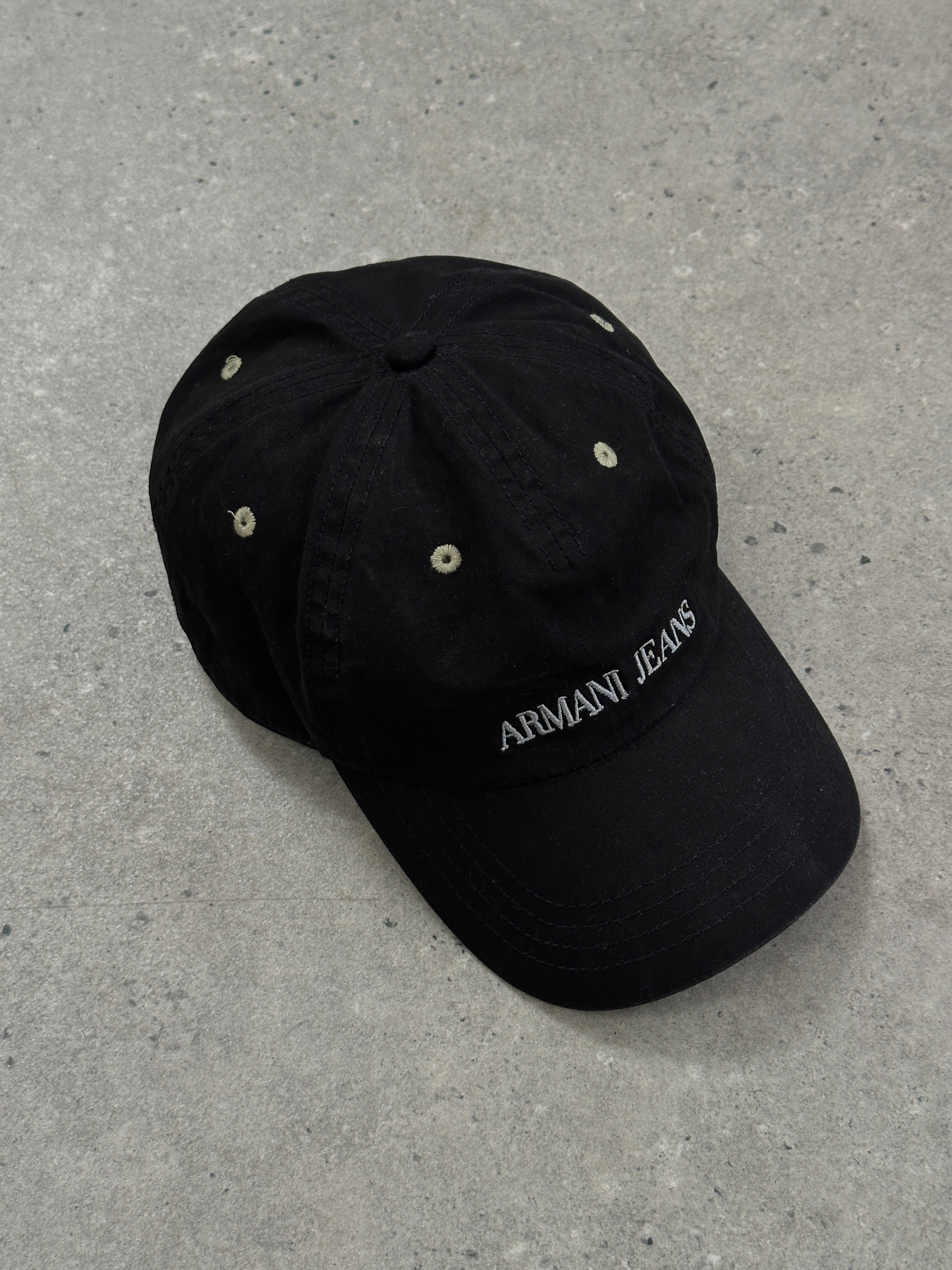 Armani Jeans pure cotton logo cap featuring a classic hat design with embroidered branding on the front.