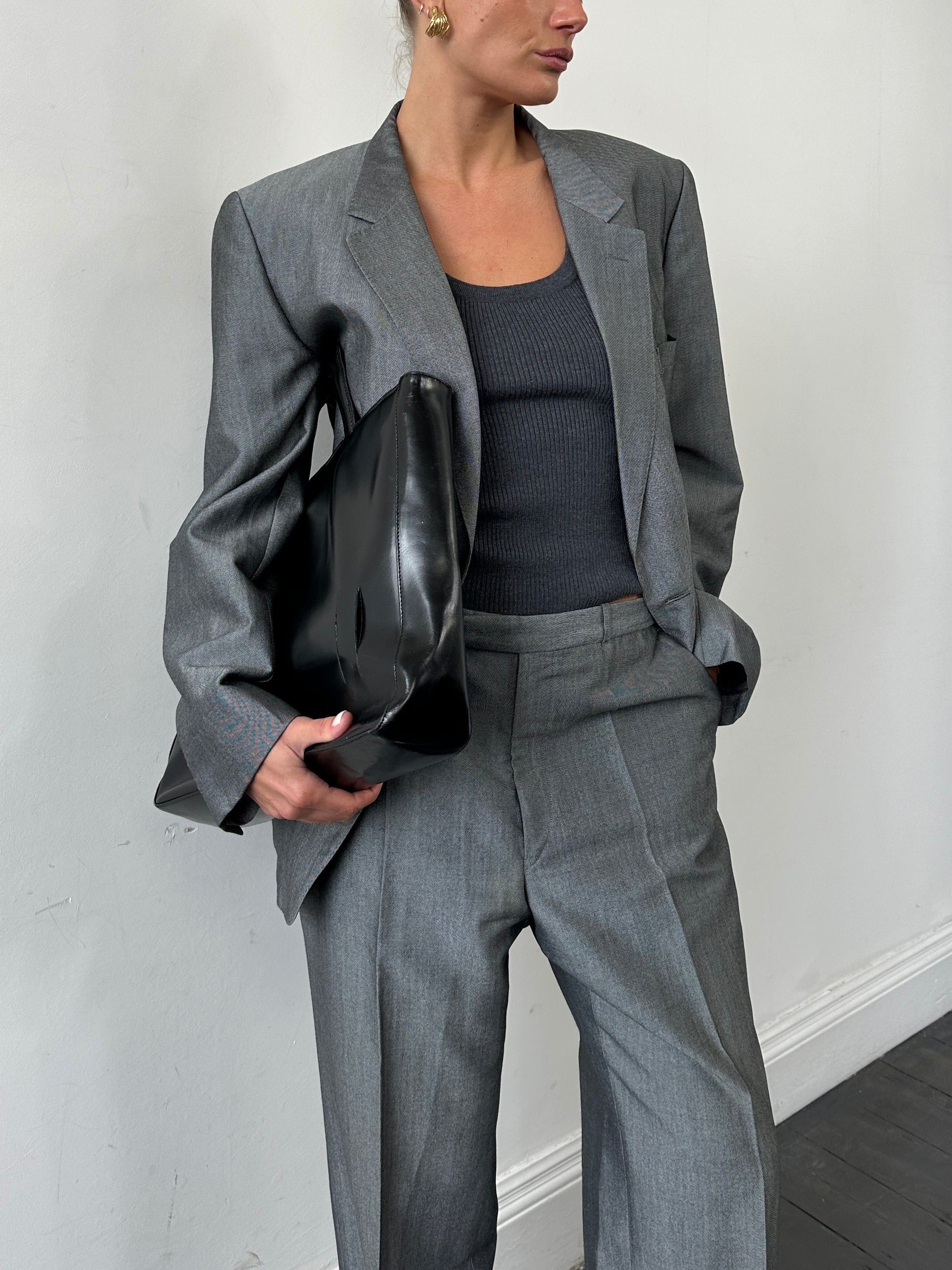 Christian Dior Monsieur wool single-breasted suit jumpsuit in size 44L/W36, tailored with classic design and refined fabric.